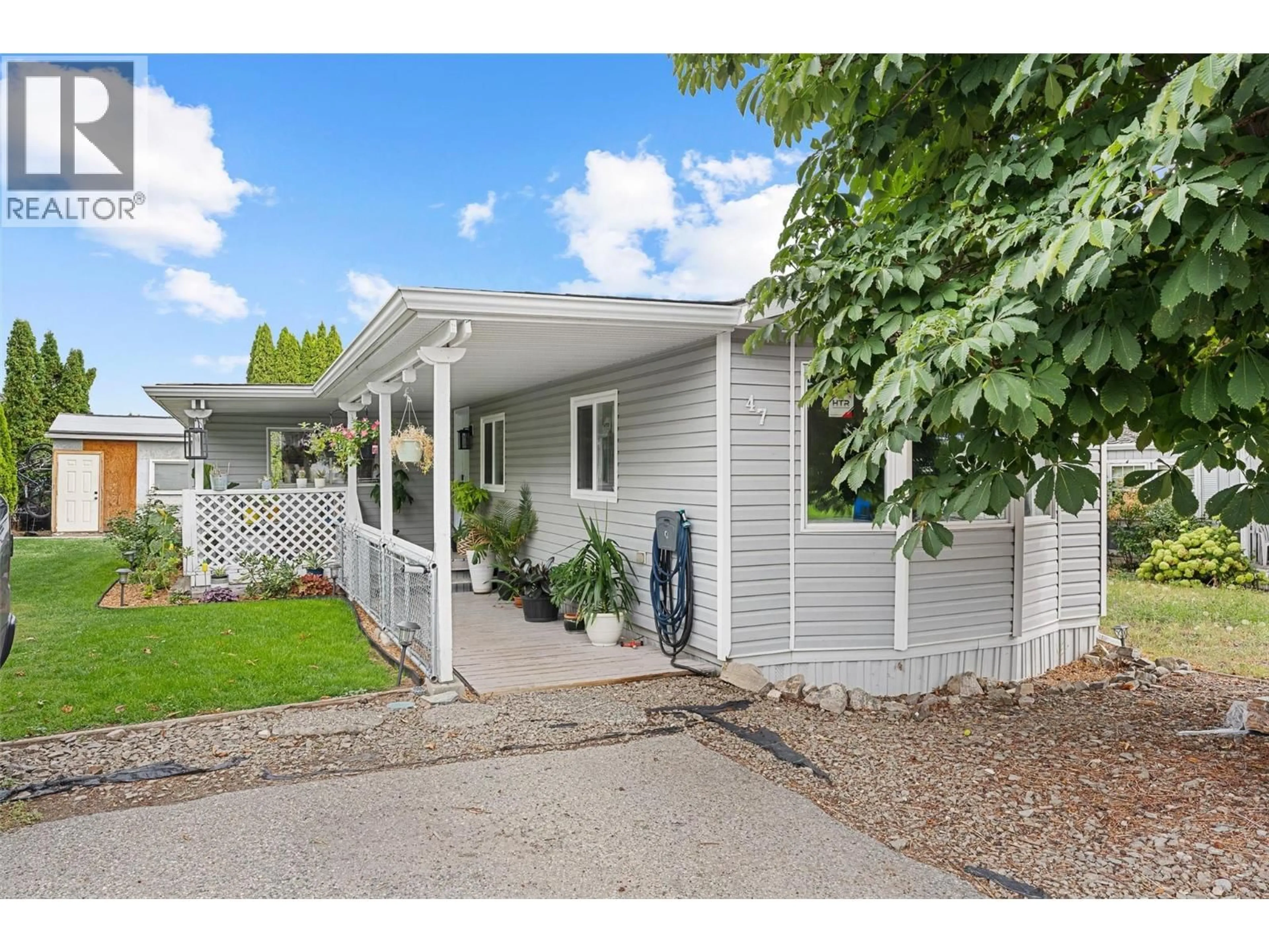 Home with vinyl exterior material, street for 47 - 3381 VILLAGE GREEN WAY, Westbank British Columbia V4T1L2