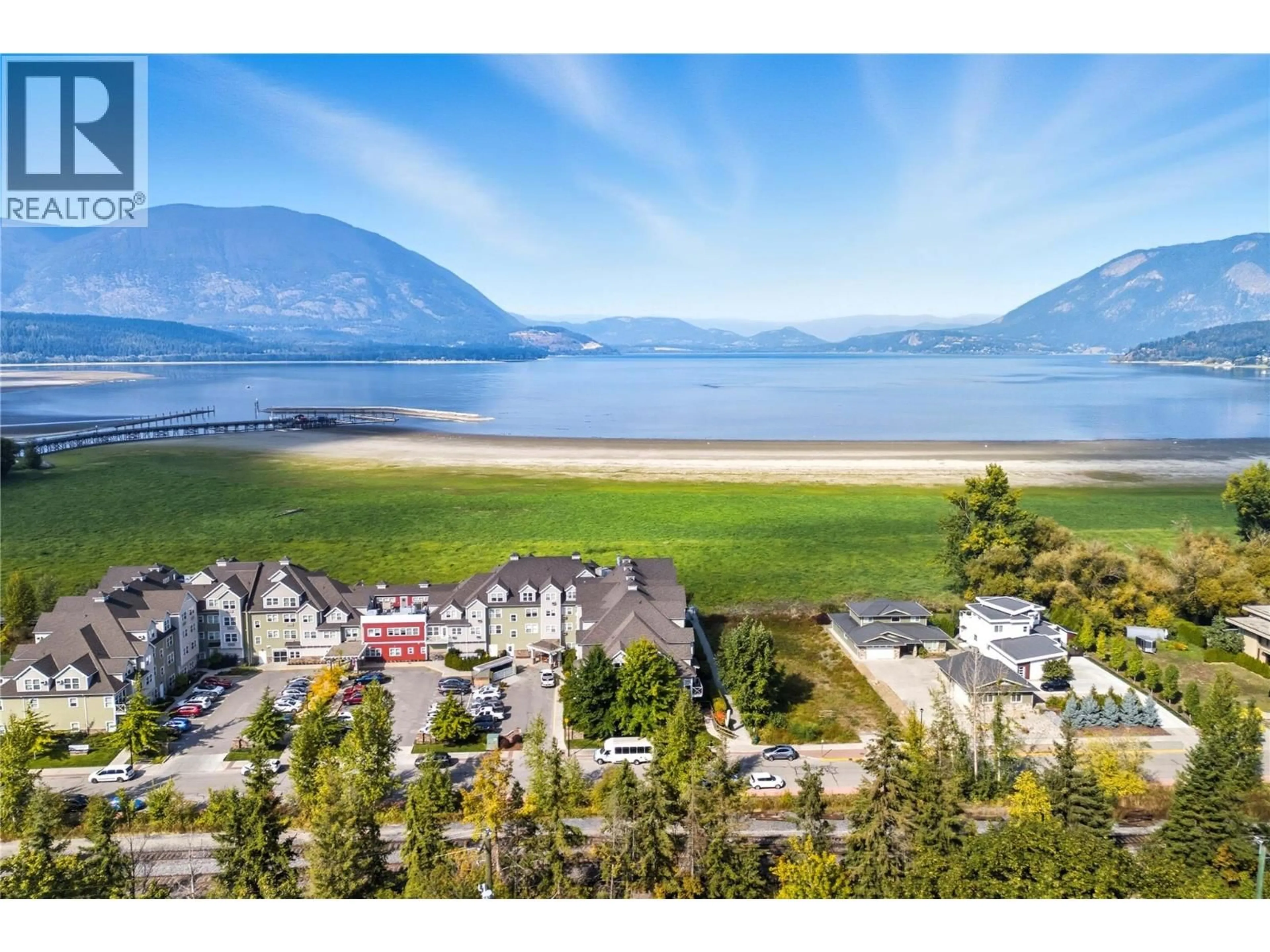 A pic from outside/outdoor area/front of a property/back of a property/a pic from drone, water/lake/river/ocean view for 730 9 AVENUE NORTHEAST, Salmon Arm British Columbia V1E4A1