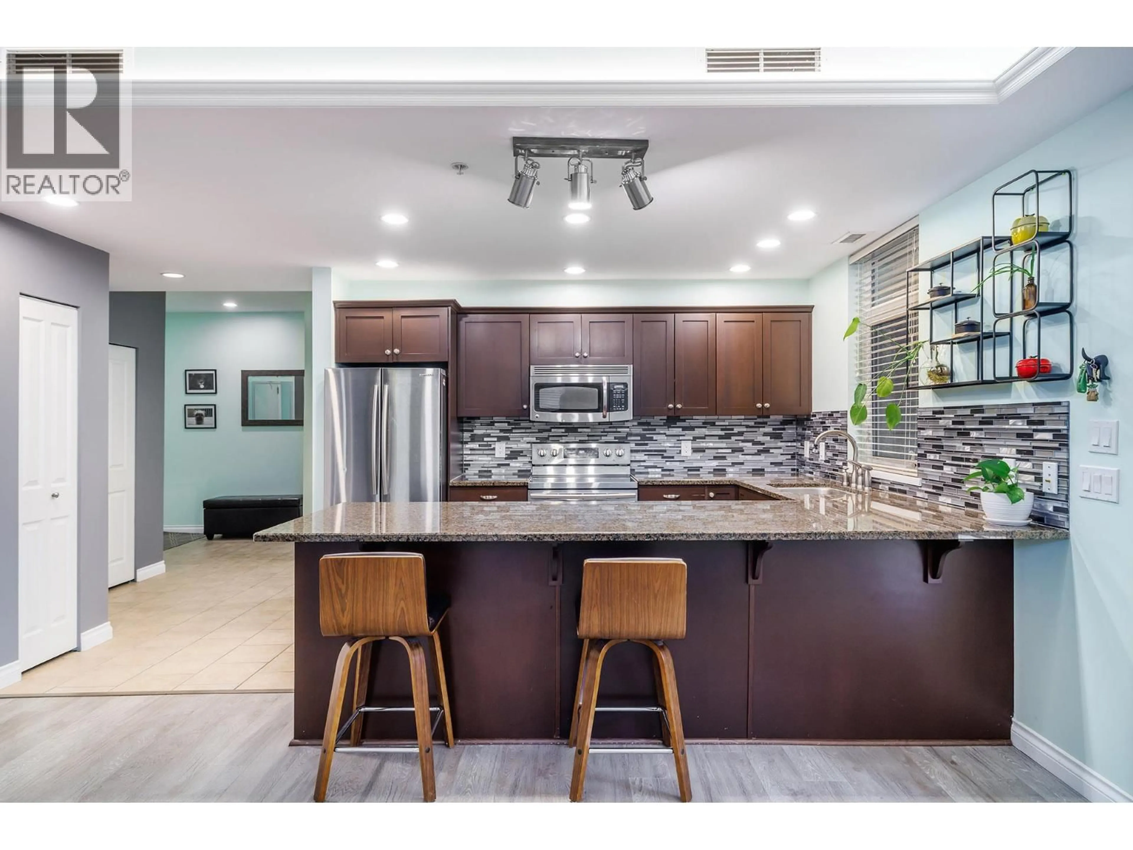 Open concept kitchen, ceramic/tile floor for 1102 - 3833 BROWN ROAD, West Kelowna British Columbia V4T2S3