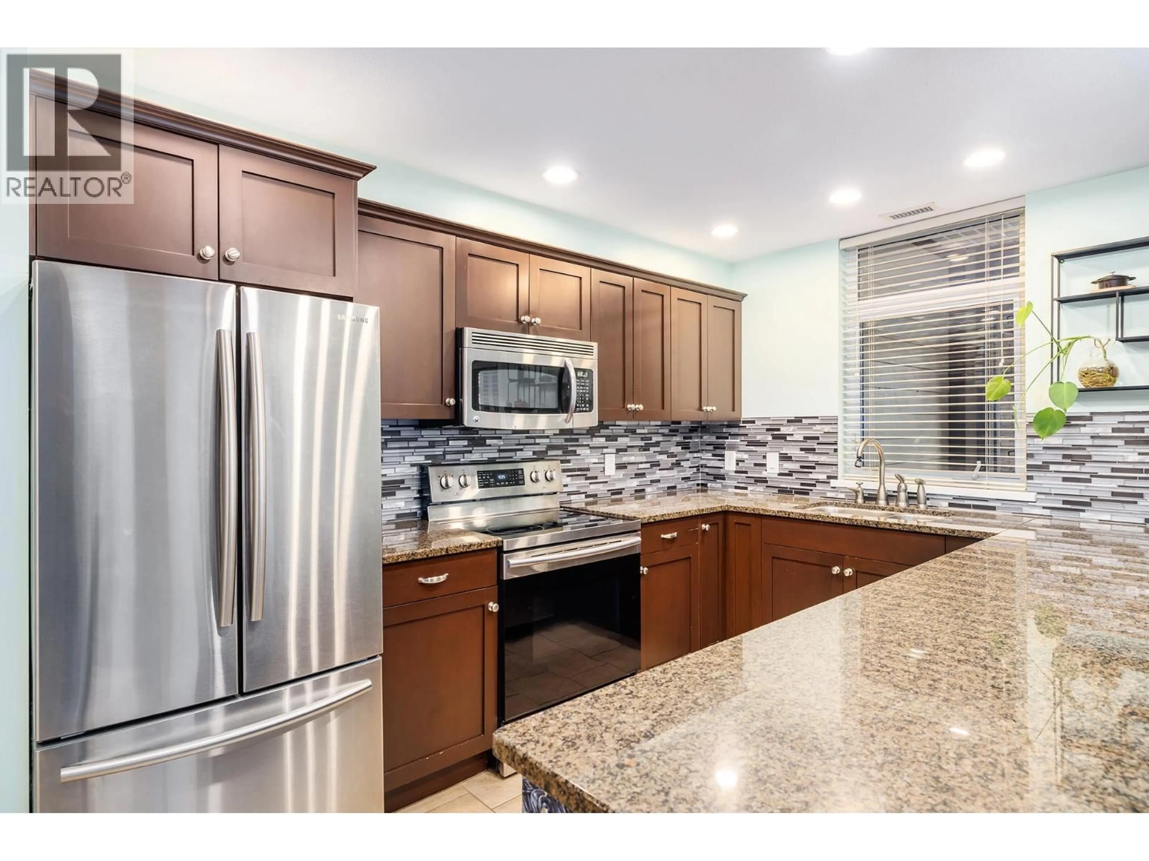 Open concept kitchen, ceramic/tile floor for 1102 - 3833 BROWN ROAD, West Kelowna British Columbia V4T2S3