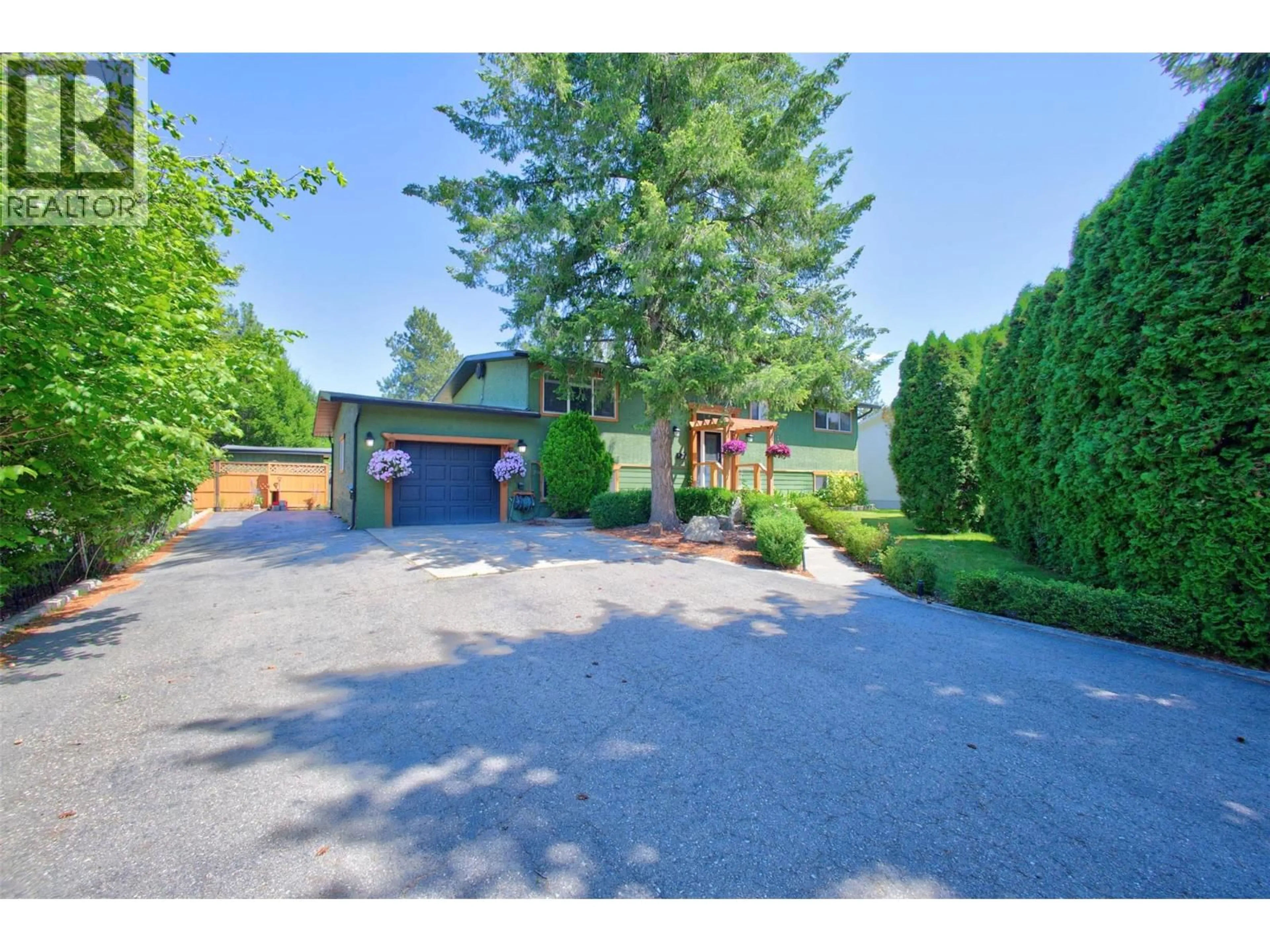 A pic from outside/outdoor area/front of a property/back of a property/a pic from drone, street for 2725 GUIDI ROAD, West Kelowna British Columbia V1Z2K3