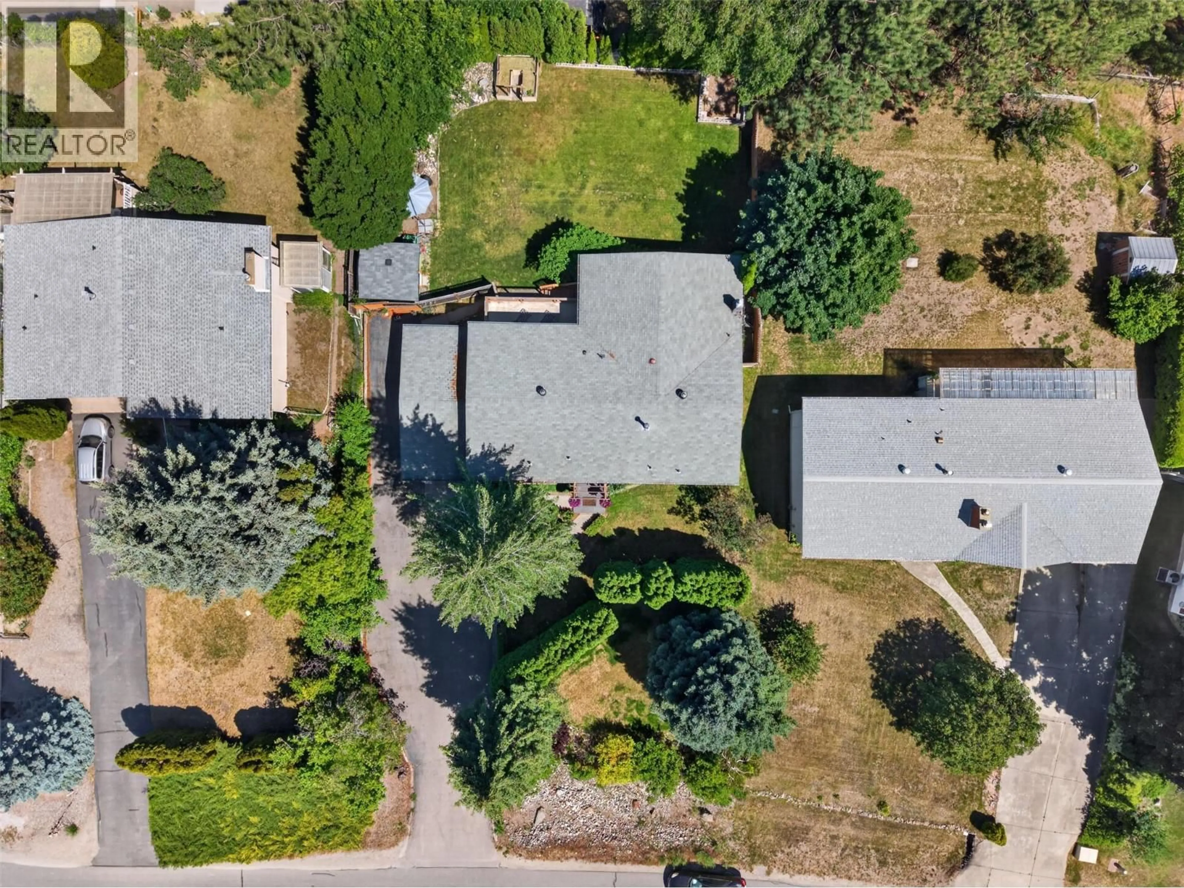 A pic from outside/outdoor area/front of a property/back of a property/a pic from drone, street for 2725 GUIDI ROAD, West Kelowna British Columbia V1Z2K3