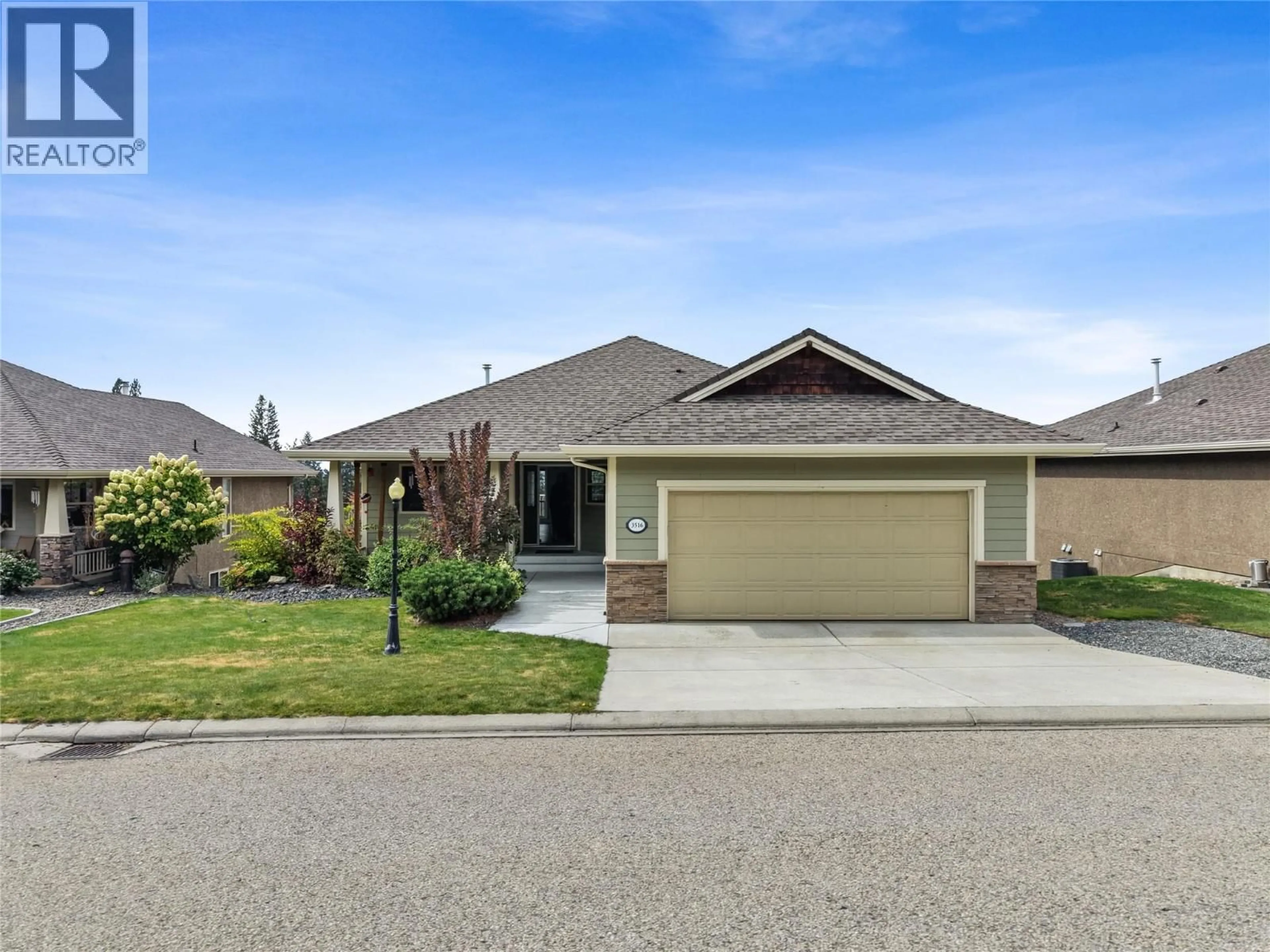 Home with vinyl exterior material, street for 3516 CAMELBACK DRIVE, Kelowna British Columbia V1X8A7