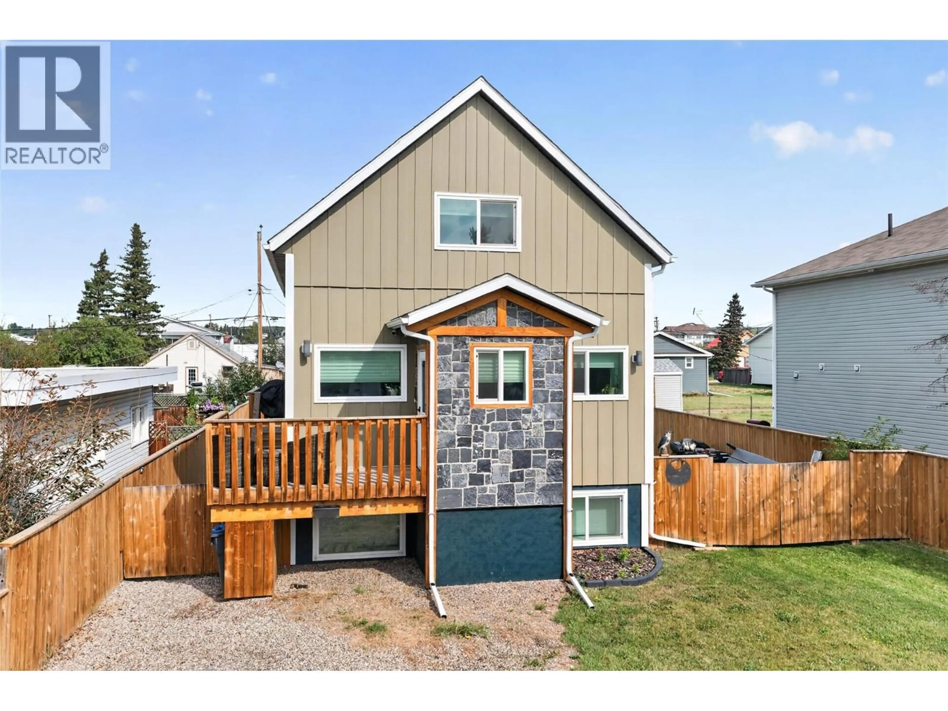Home with vinyl exterior material, street for 1416 105 AVENUE, Dawson Creek British Columbia V1G2M2
