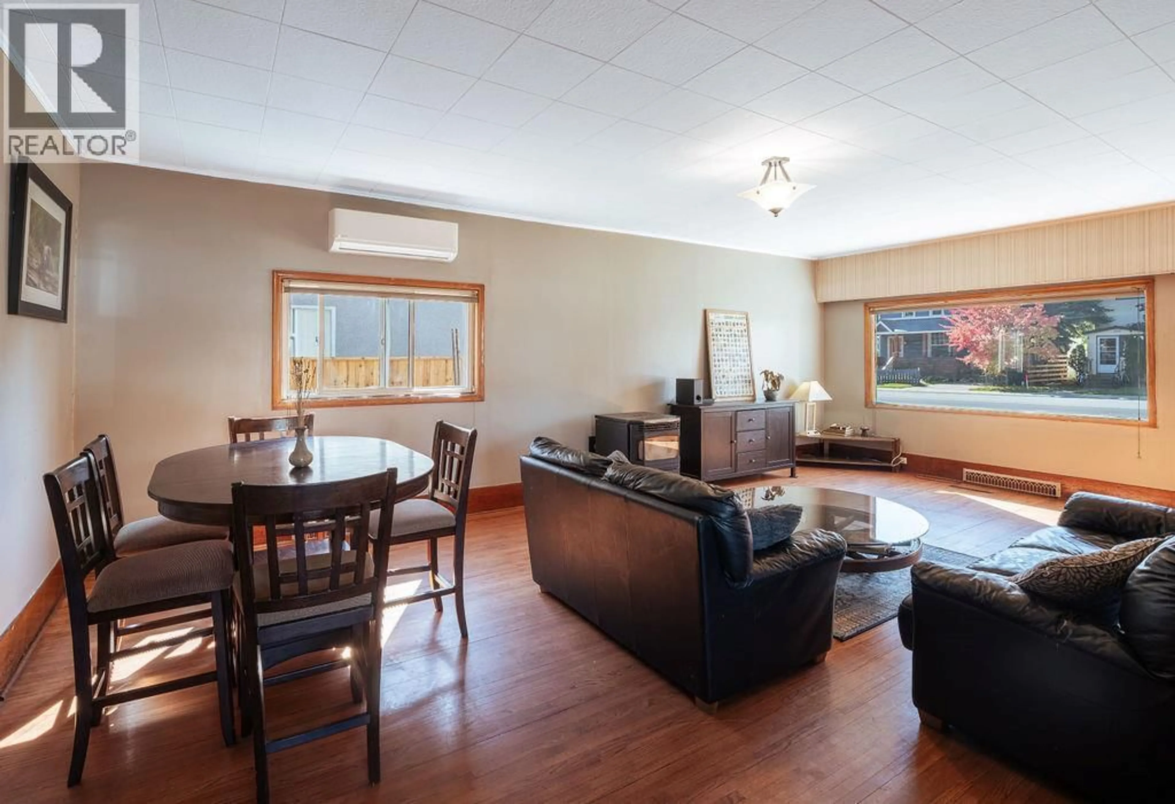 Living room with furniture, wood/laminate floor for 204 THIRD STREET EAST, Revelstoke British Columbia V0E2S0