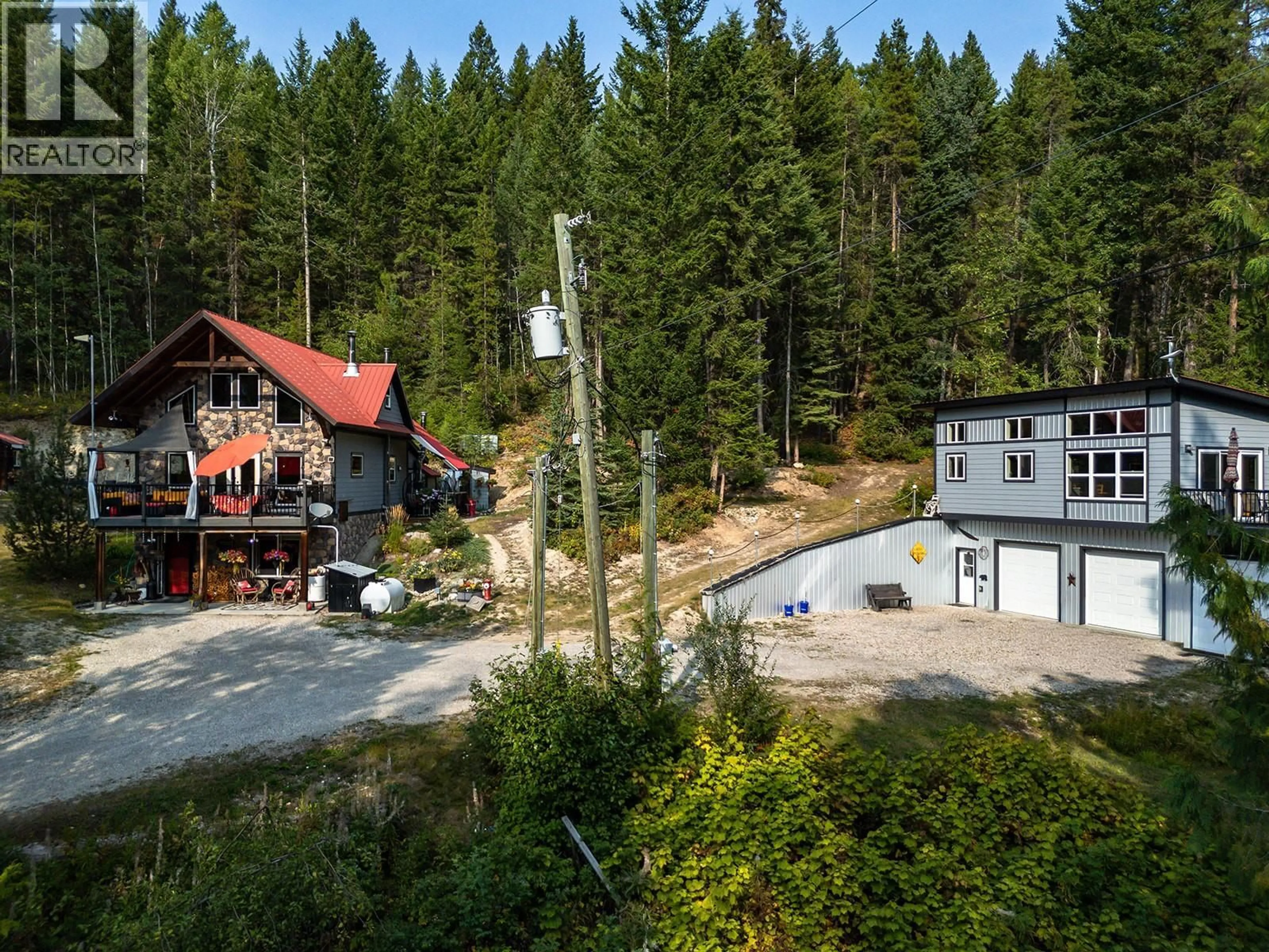 A pic from outside/outdoor area/front of a property/back of a property/a pic from drone, forest/trees view for 1960 PALUMBO HEIGHTS DRIVE, Golden British Columbia V0A1H4