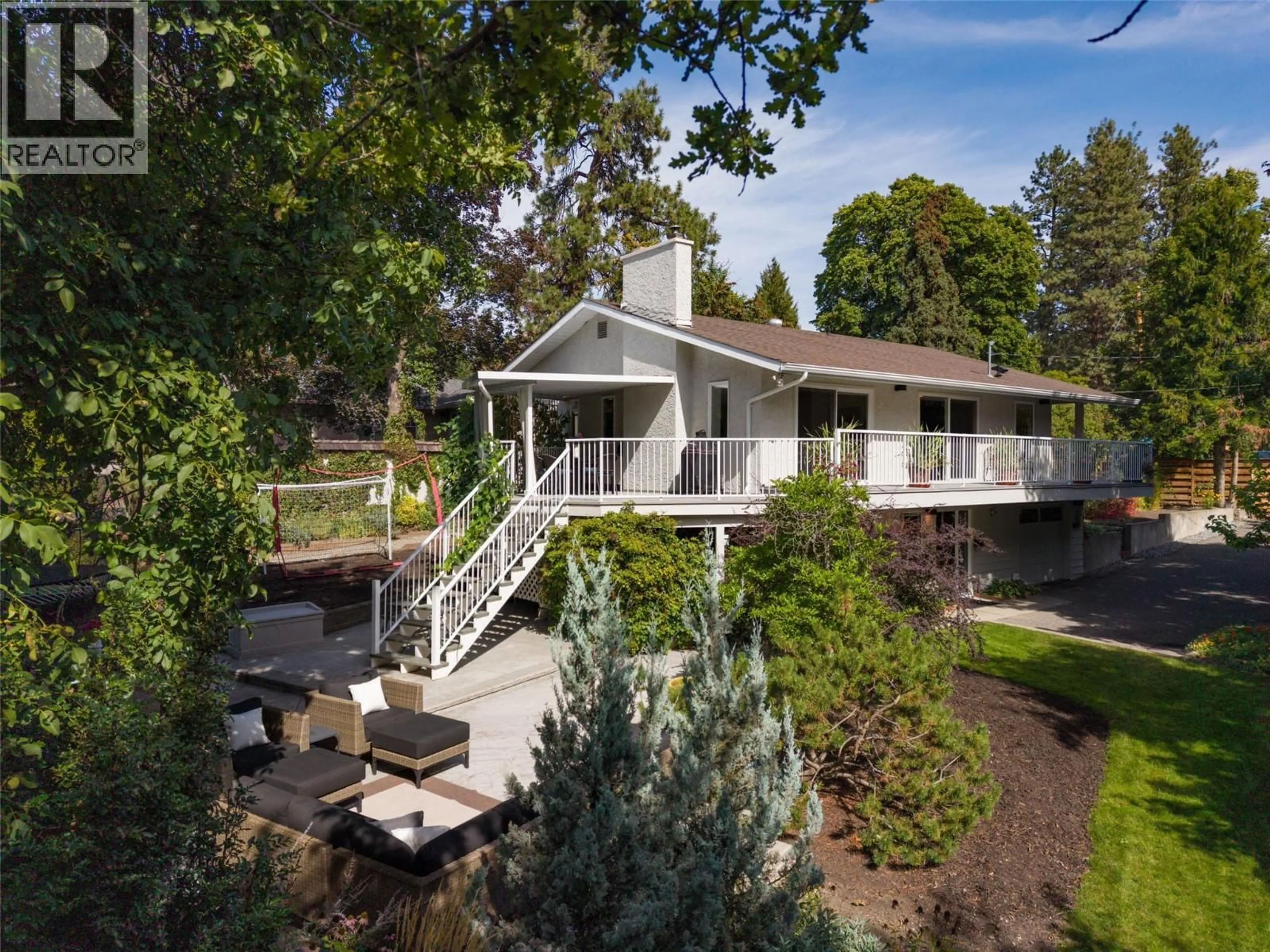 A pic from outside/outdoor area/front of a property/back of a property/a pic from drone, mountain view for 1764 HIGHLAND DRIVE NORTH, Kelowna British Columbia V1Y4L1