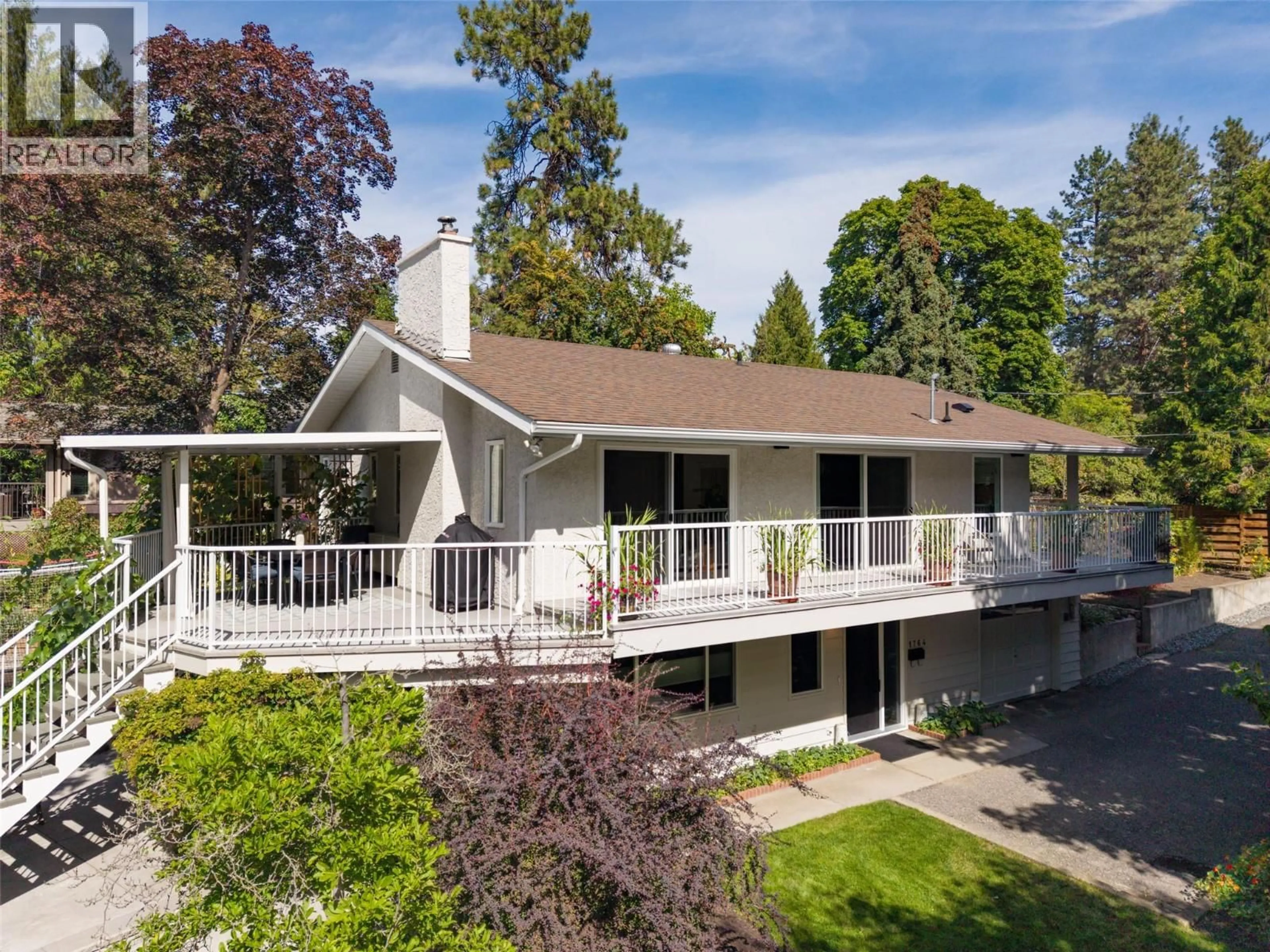 Home with vinyl exterior material, unknown for 1764 HIGHLAND DRIVE NORTH, Kelowna British Columbia V1Y4L1