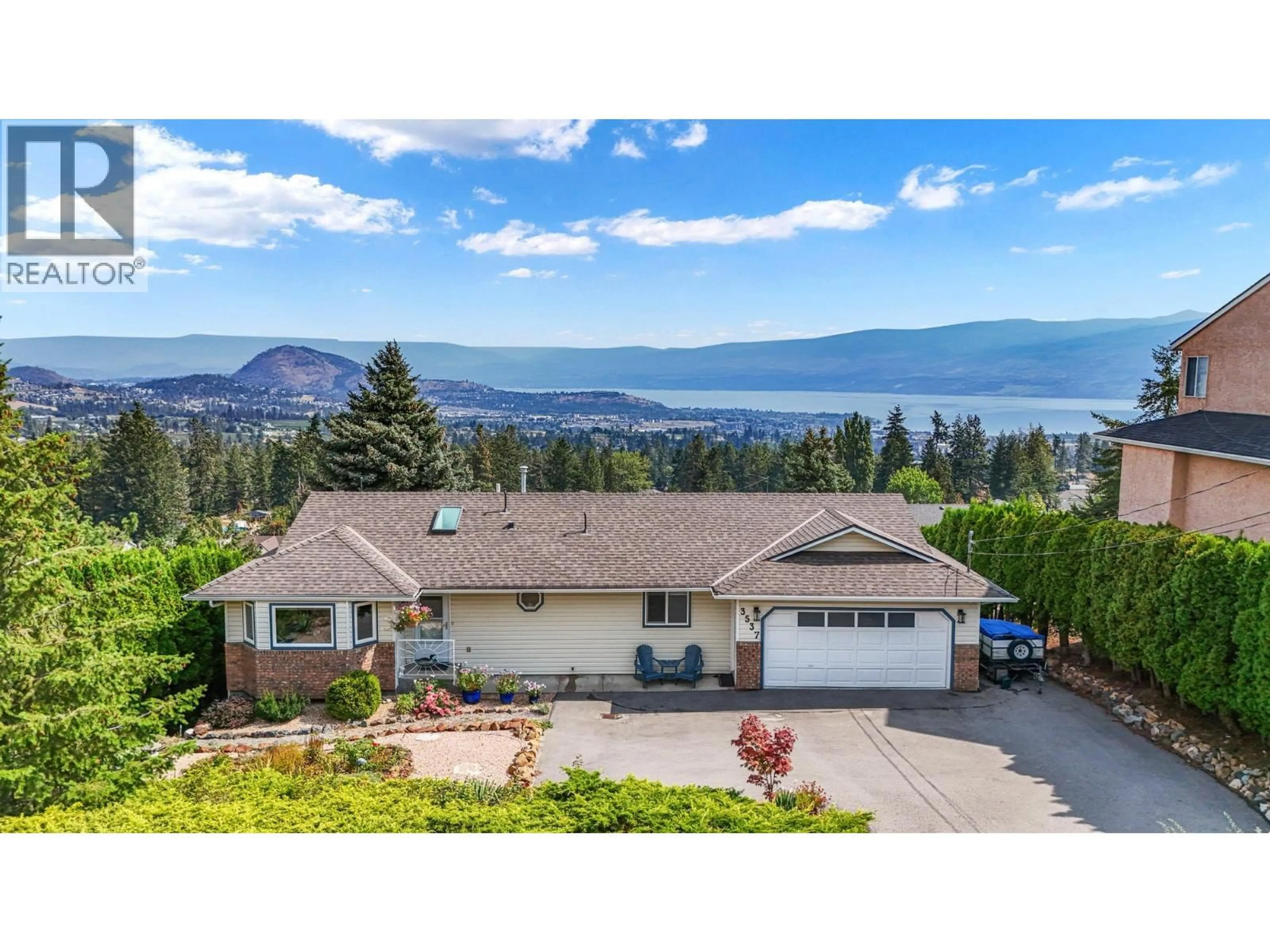 A pic from outside/outdoor area/front of a property/back of a property/a pic from drone, water/lake/river/ocean view for 3537 GATES ROAD, West Kelowna British Columbia V4T1A2
