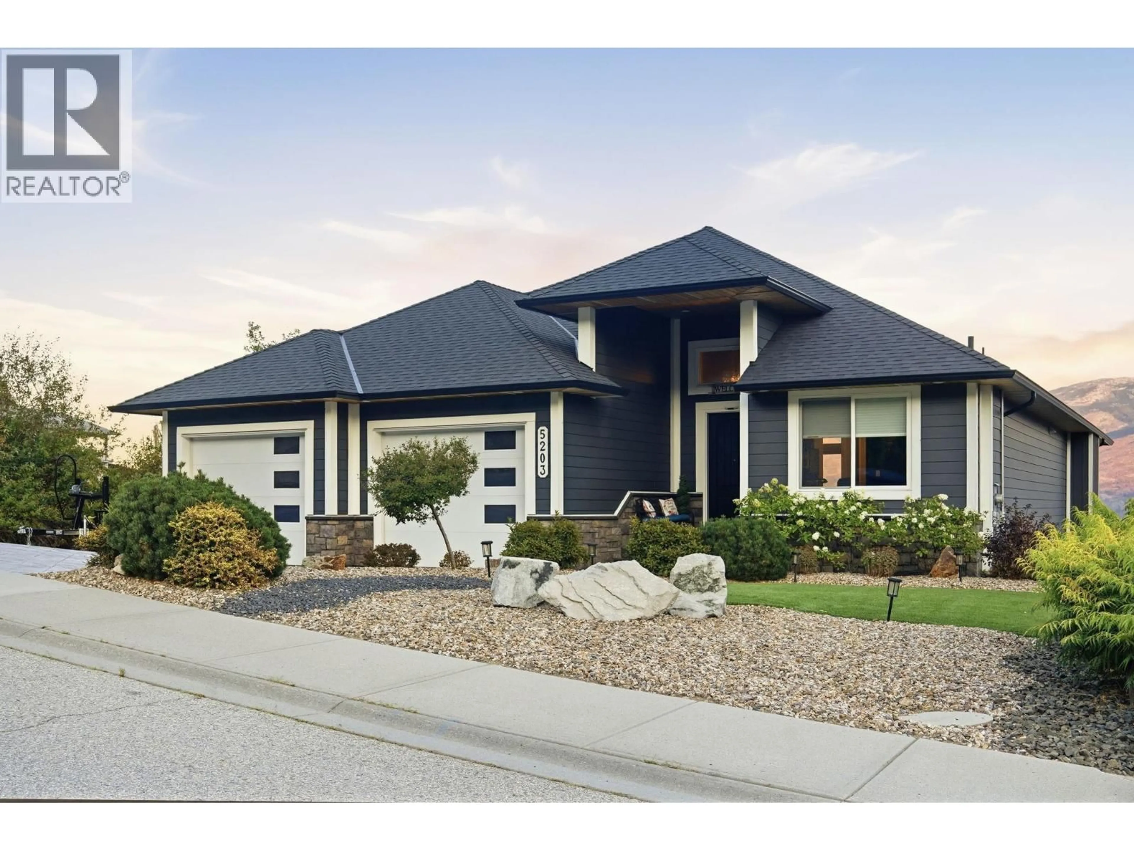 Home with vinyl exterior material, street for 5203 CLARENCE ROAD, Peachland British Columbia V0H1X2