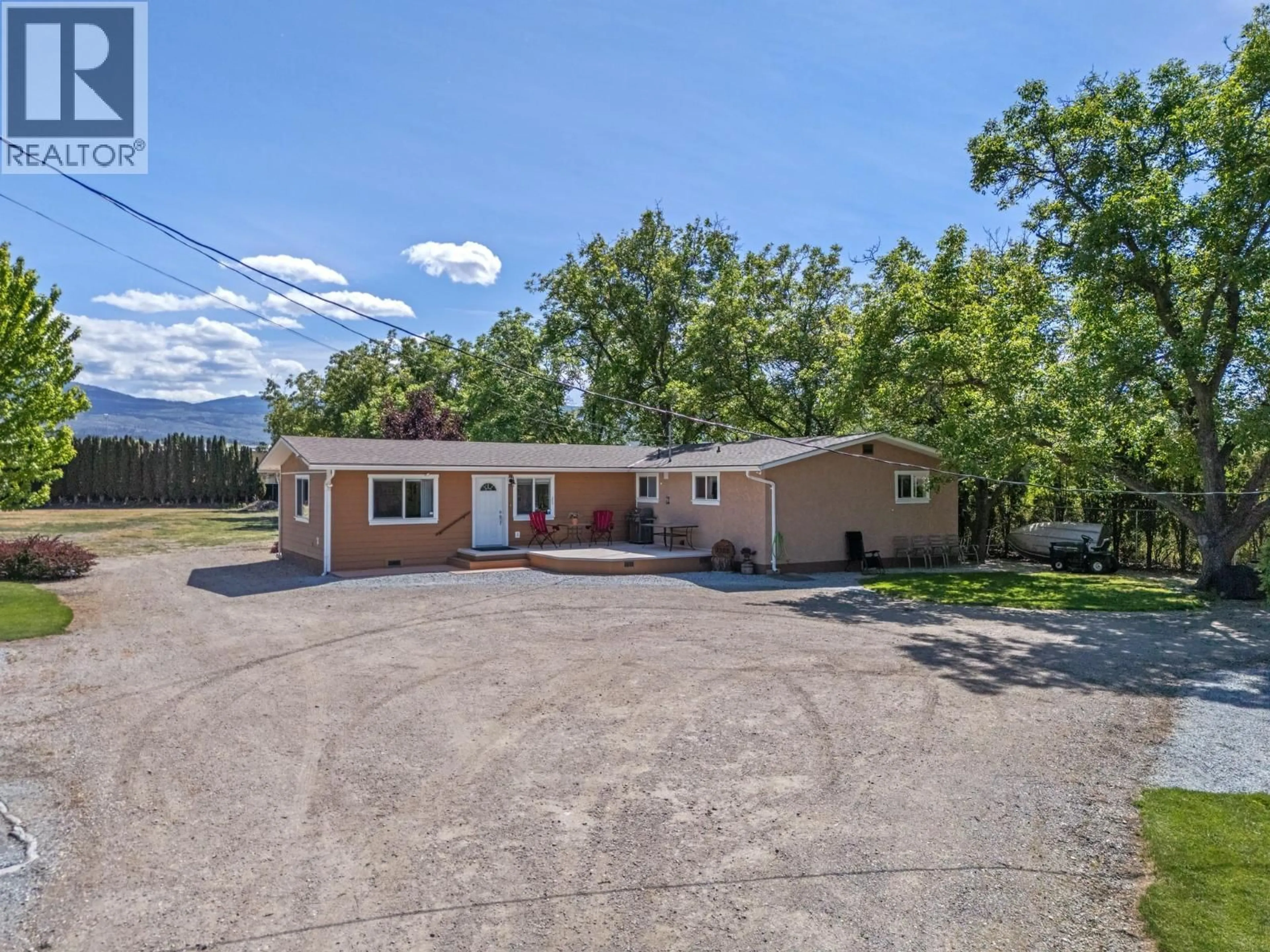 A pic from outside/outdoor area/front of a property/back of a property/a pic from drone, street for 1789 MUNSON ROAD, Kelowna British Columbia V1W2G8