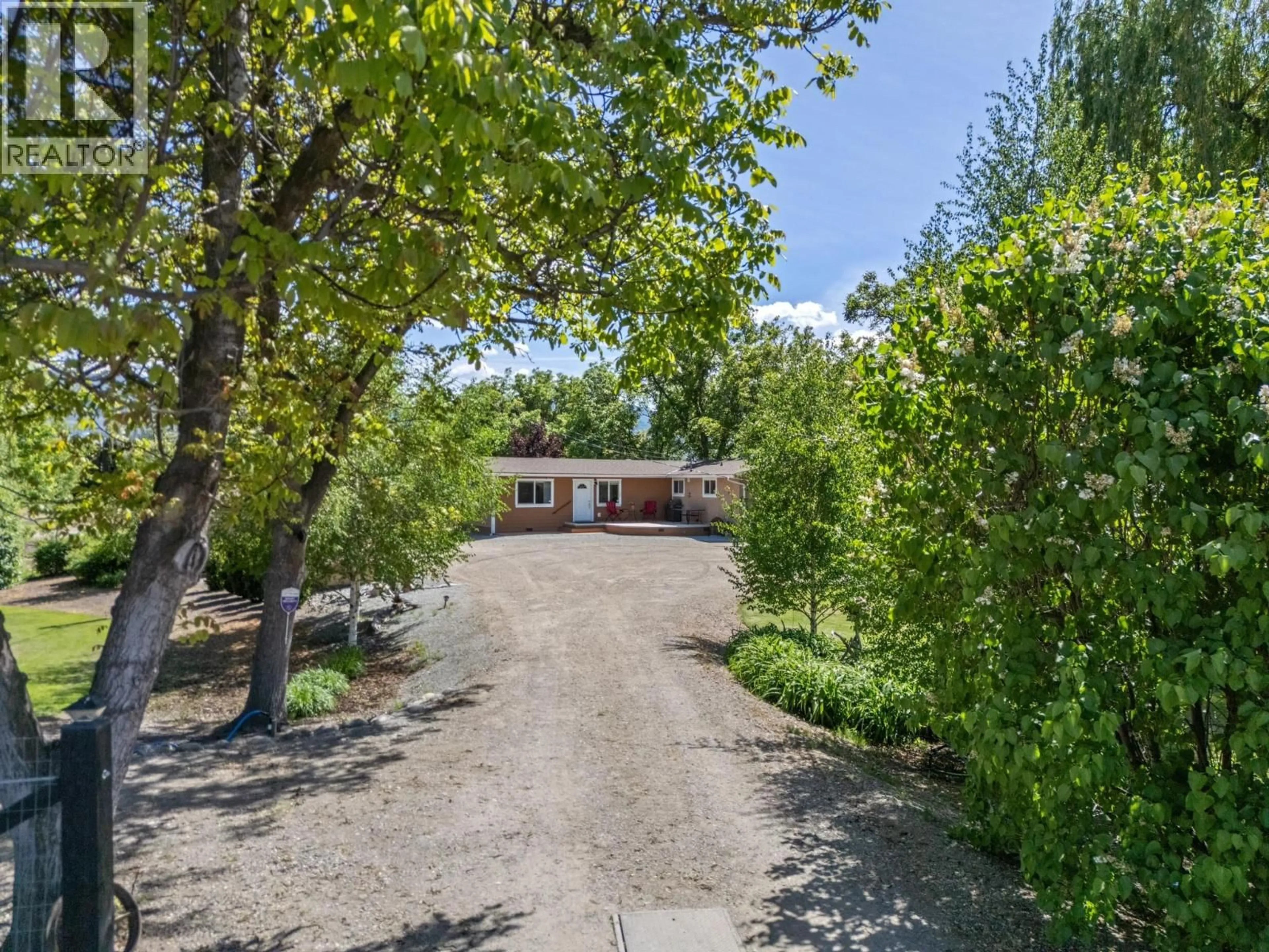 A pic from outside/outdoor area/front of a property/back of a property/a pic from drone, street for 1789 MUNSON ROAD, Kelowna British Columbia V1W2G8