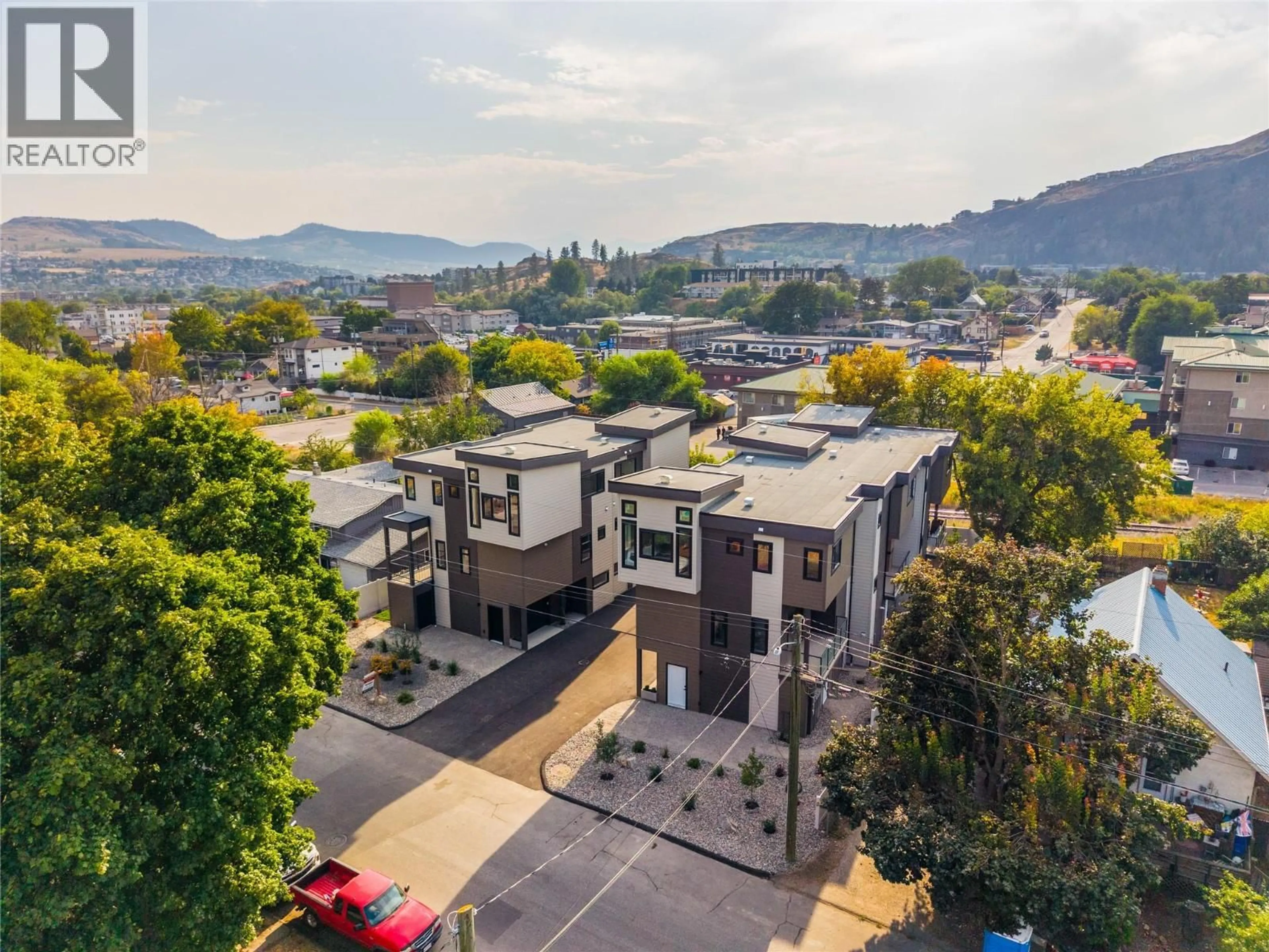 A pic from outside/outdoor area/front of a property/back of a property/a pic from drone, mountain view for 4200 30 STREET, Vernon British Columbia V1T5G3