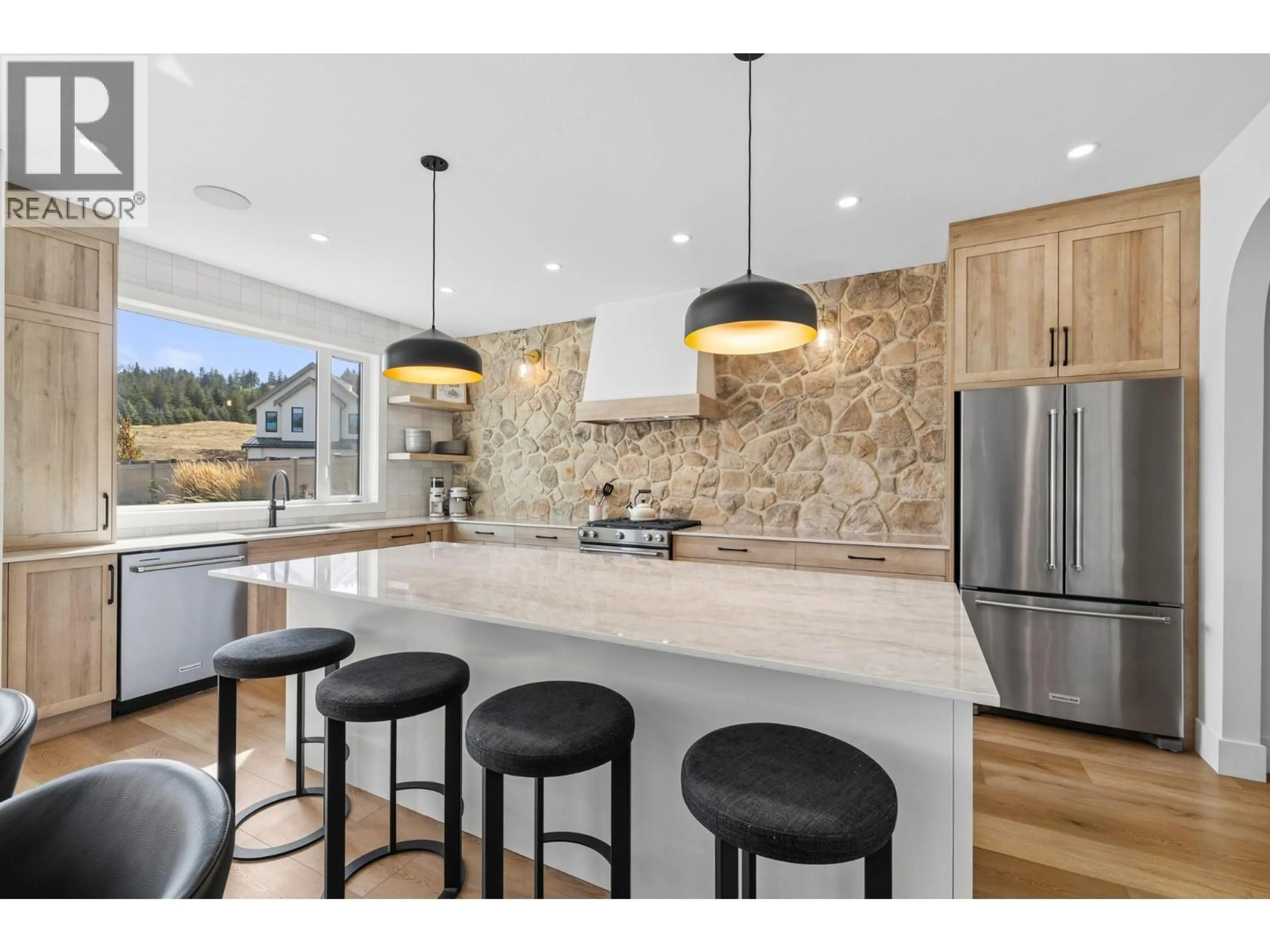 Open concept kitchen, ceramic/tile floor for 4231 RUSSO STREET, Kelowna British Columbia V1W0C6