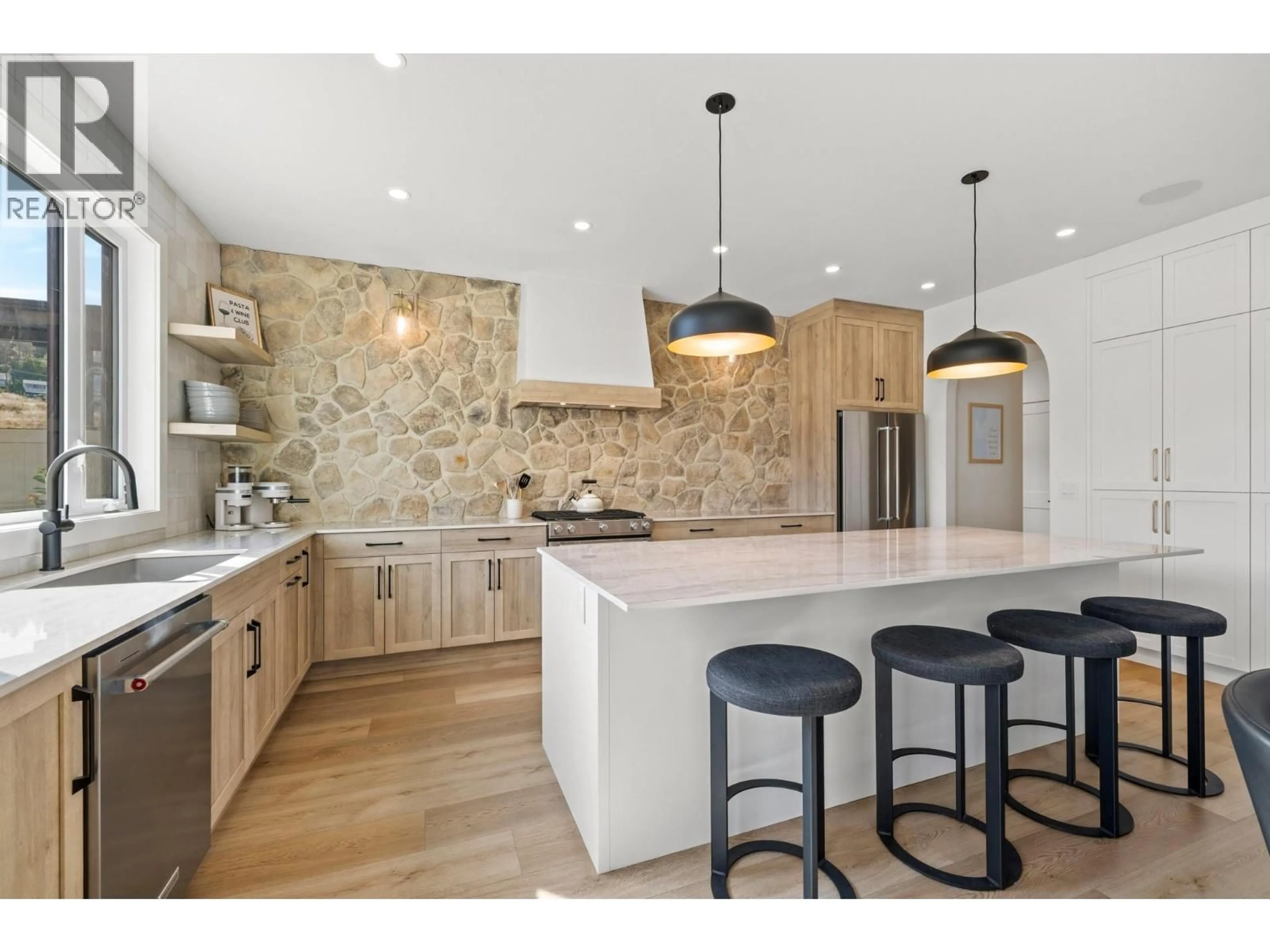 Open concept kitchen, ceramic/tile floor for 4231 RUSSO STREET, Kelowna British Columbia V1W0C6