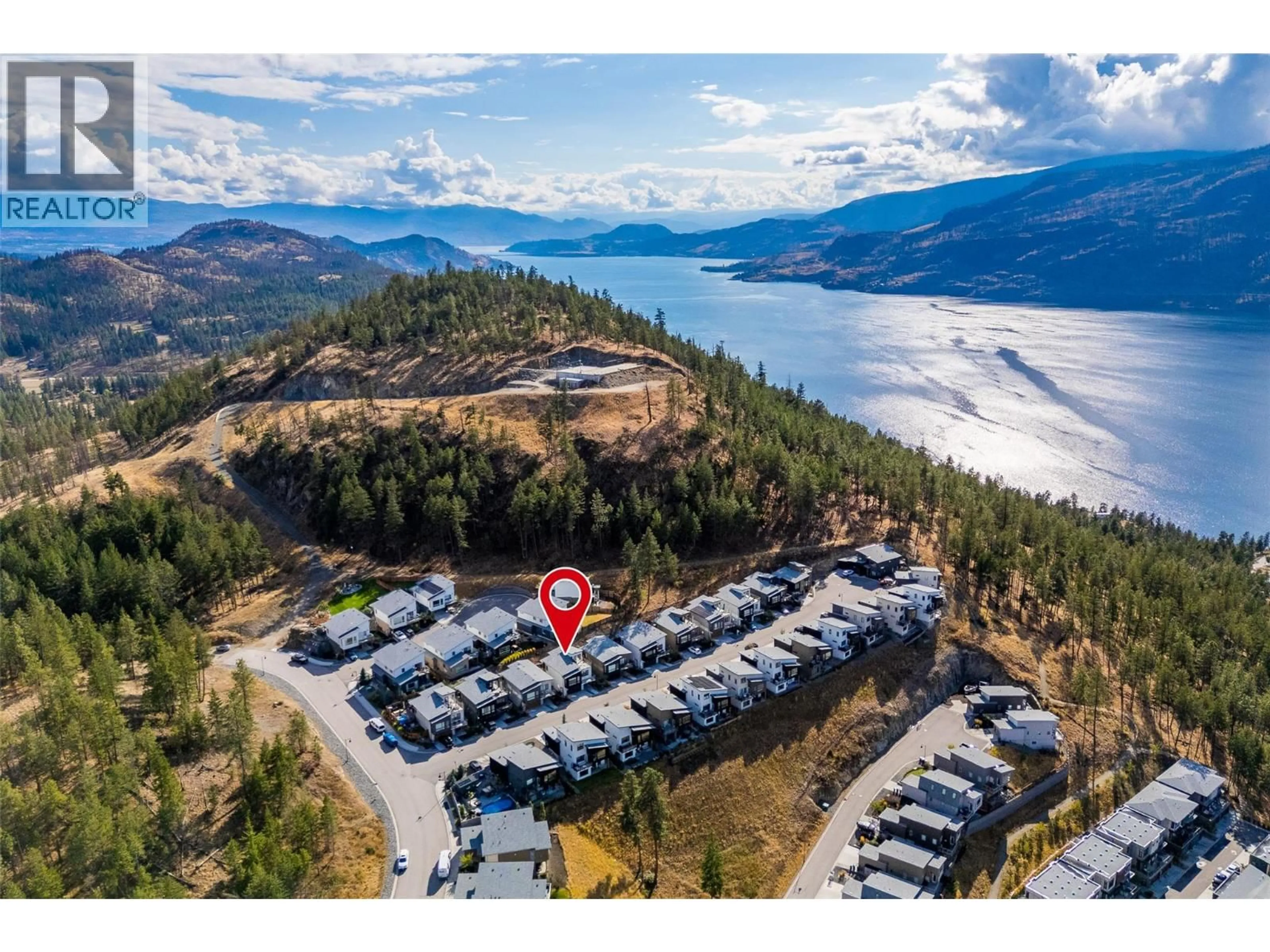 A pic from outside/outdoor area/front of a property/back of a property/a pic from drone, mountain view for 1863 GREY OWL COURT, Kelowna British Columbia V1V0C6