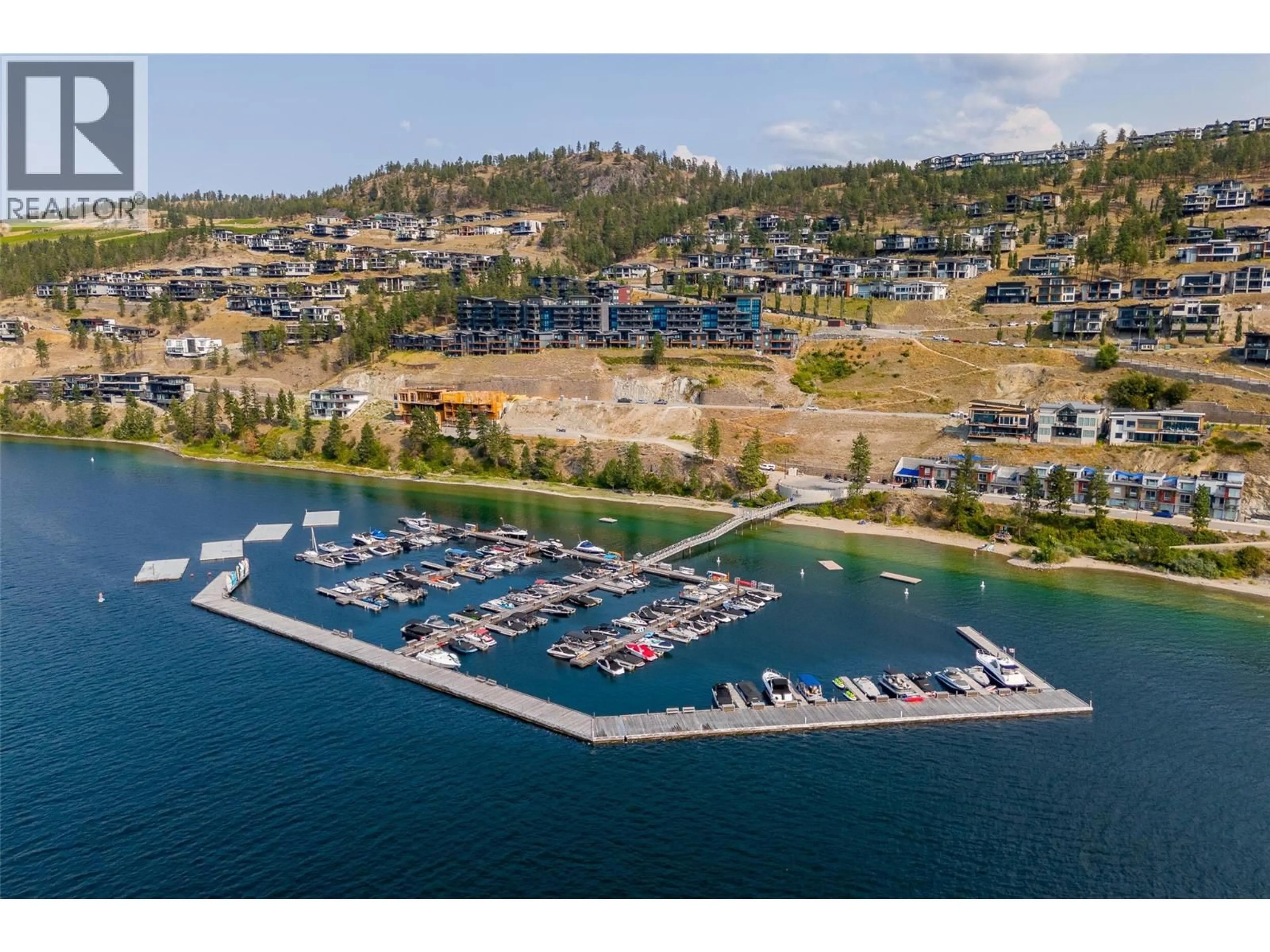 A pic from outside/outdoor area/front of a property/back of a property/a pic from drone, water/lake/river/ocean view for 1863 GREY OWL COURT, Kelowna British Columbia V1V0C6