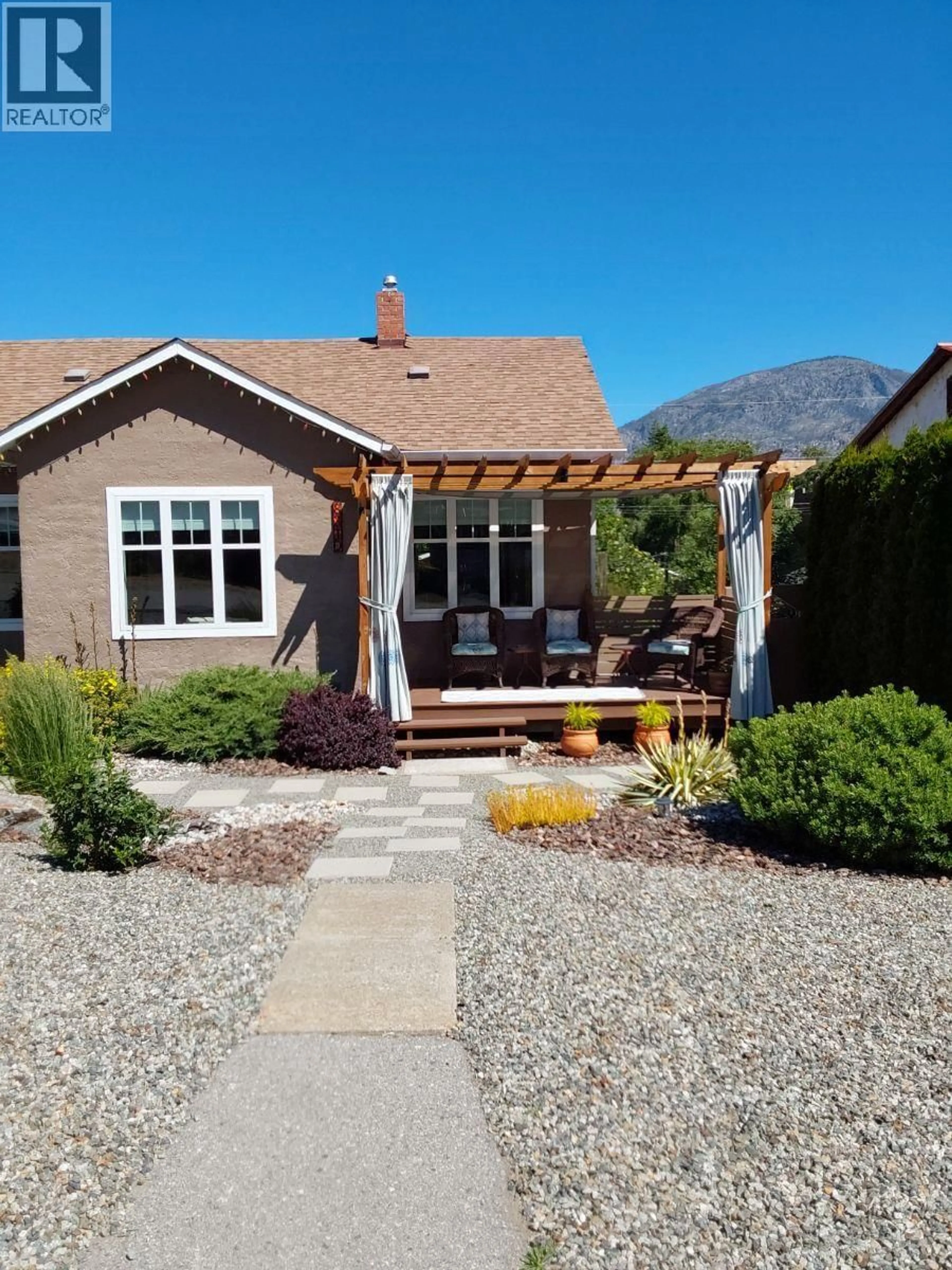 Home with brick exterior material, street for 8310 70TH AVENUE, Osoyoos British Columbia V0H1V7
