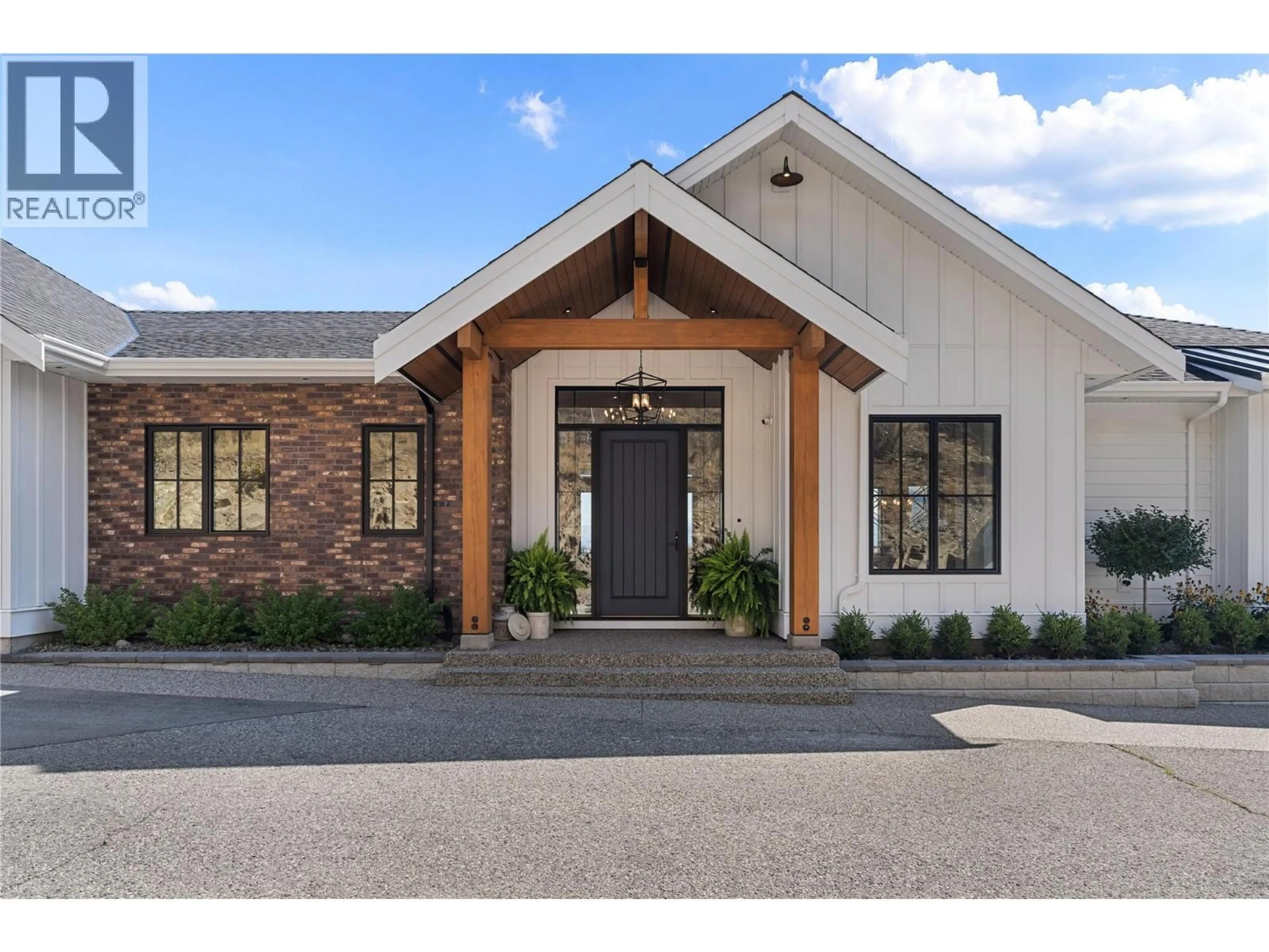 Home with brick exterior material, unknown for 902 LLOYD JONES DRIVE, West Kelowna British Columbia V1Z2X9