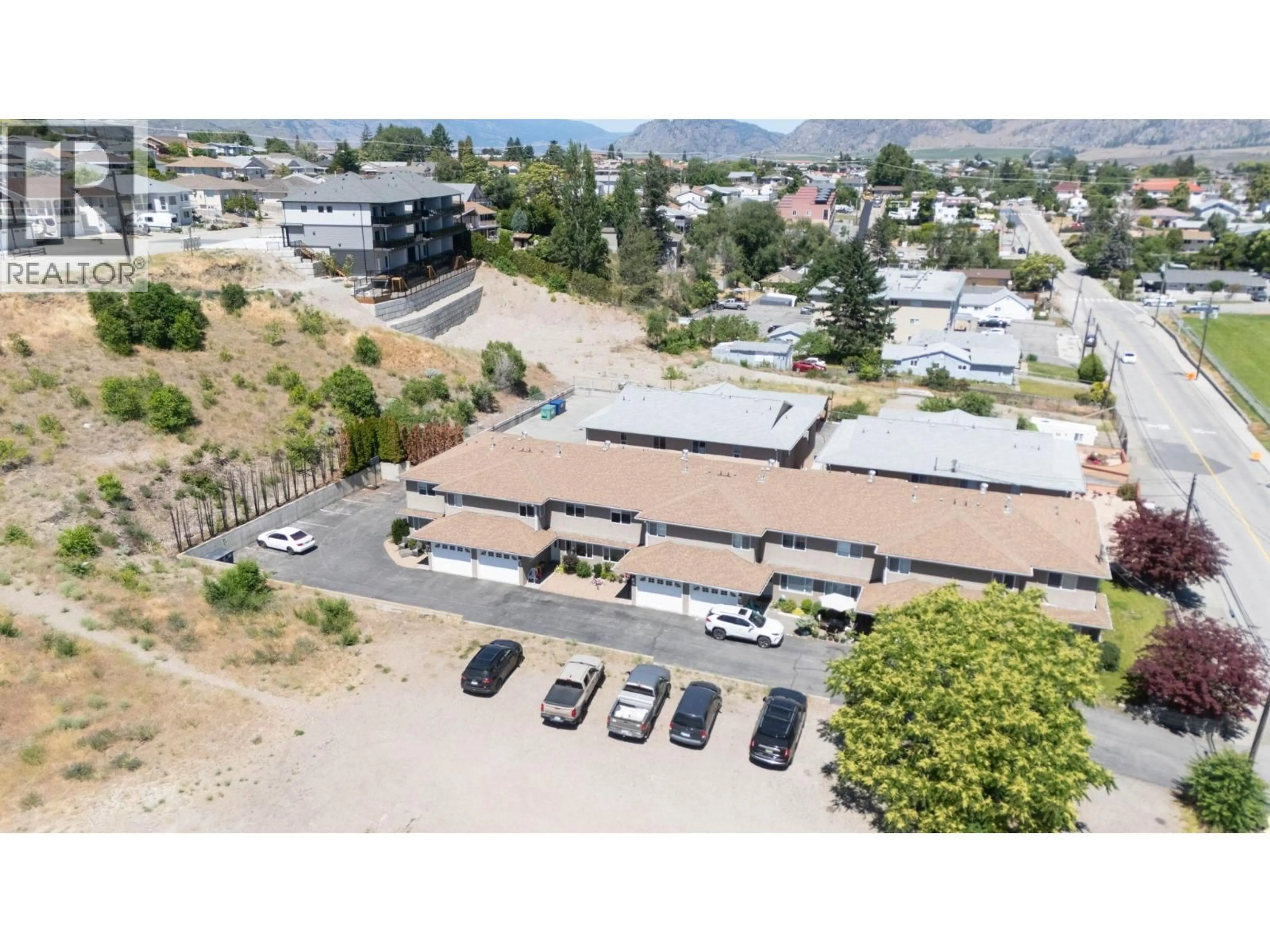 A pic from outside/outdoor area/front of a property/back of a property/a pic from drone, mountain view for 5 - 6812 89TH STREET, Osoyoos British Columbia V0H1V1