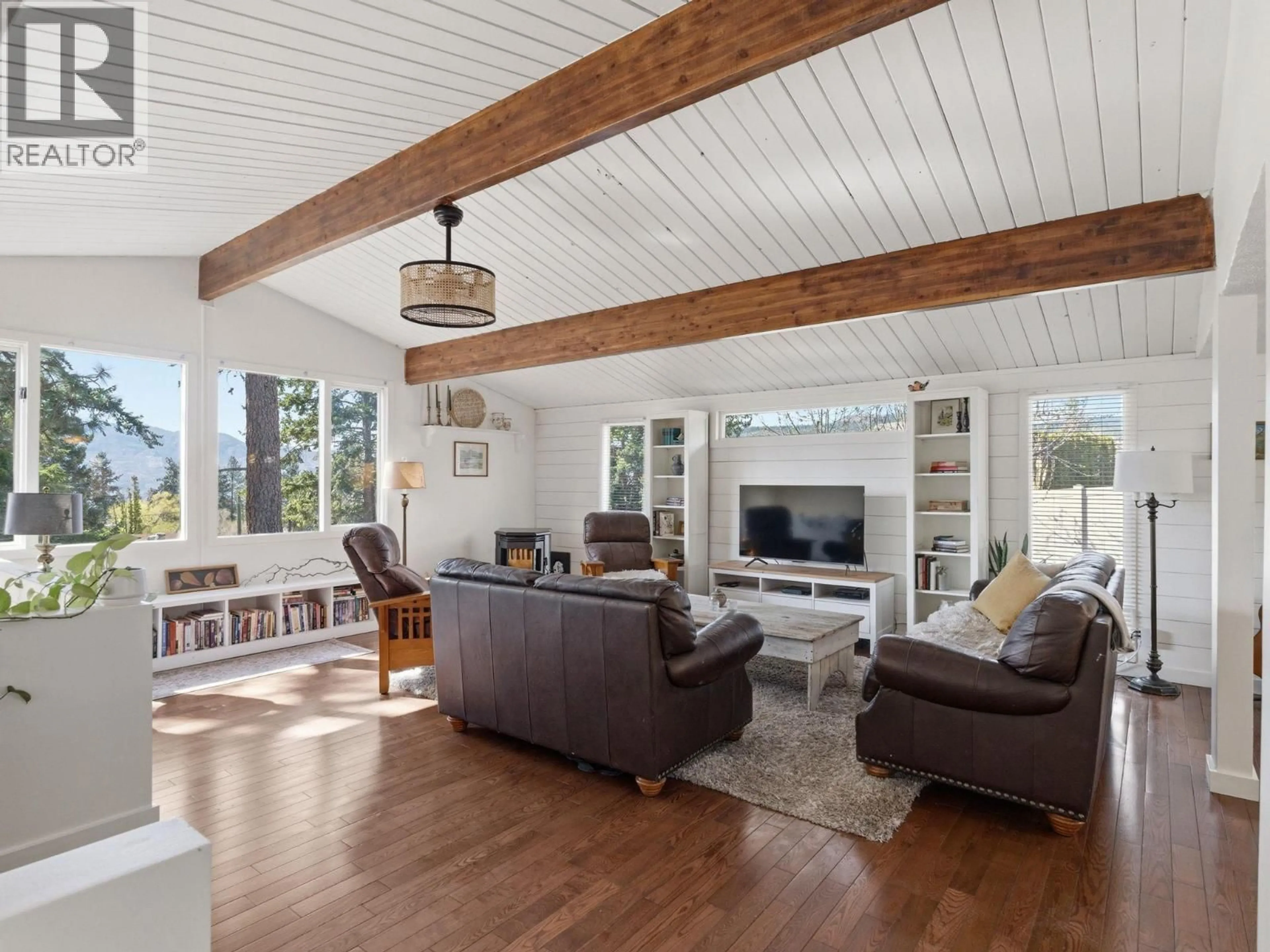 Living room with furniture, wood/laminate floor for 3090 SMITH CREEK ROAD, West Kelowna British Columbia V4T1M8