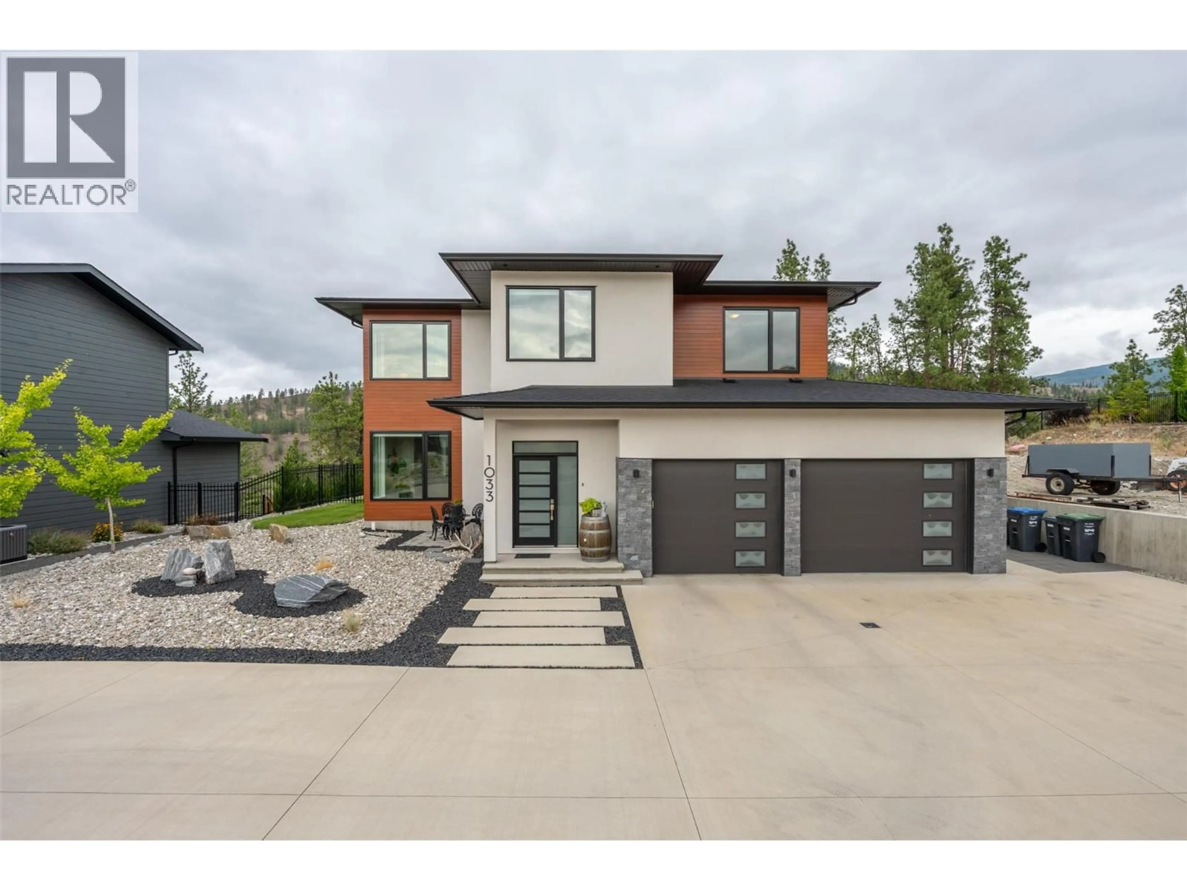 Home with brick exterior material, street for 1033 ANTLER DRIVE, Penticton British Columbia V2A0C8
