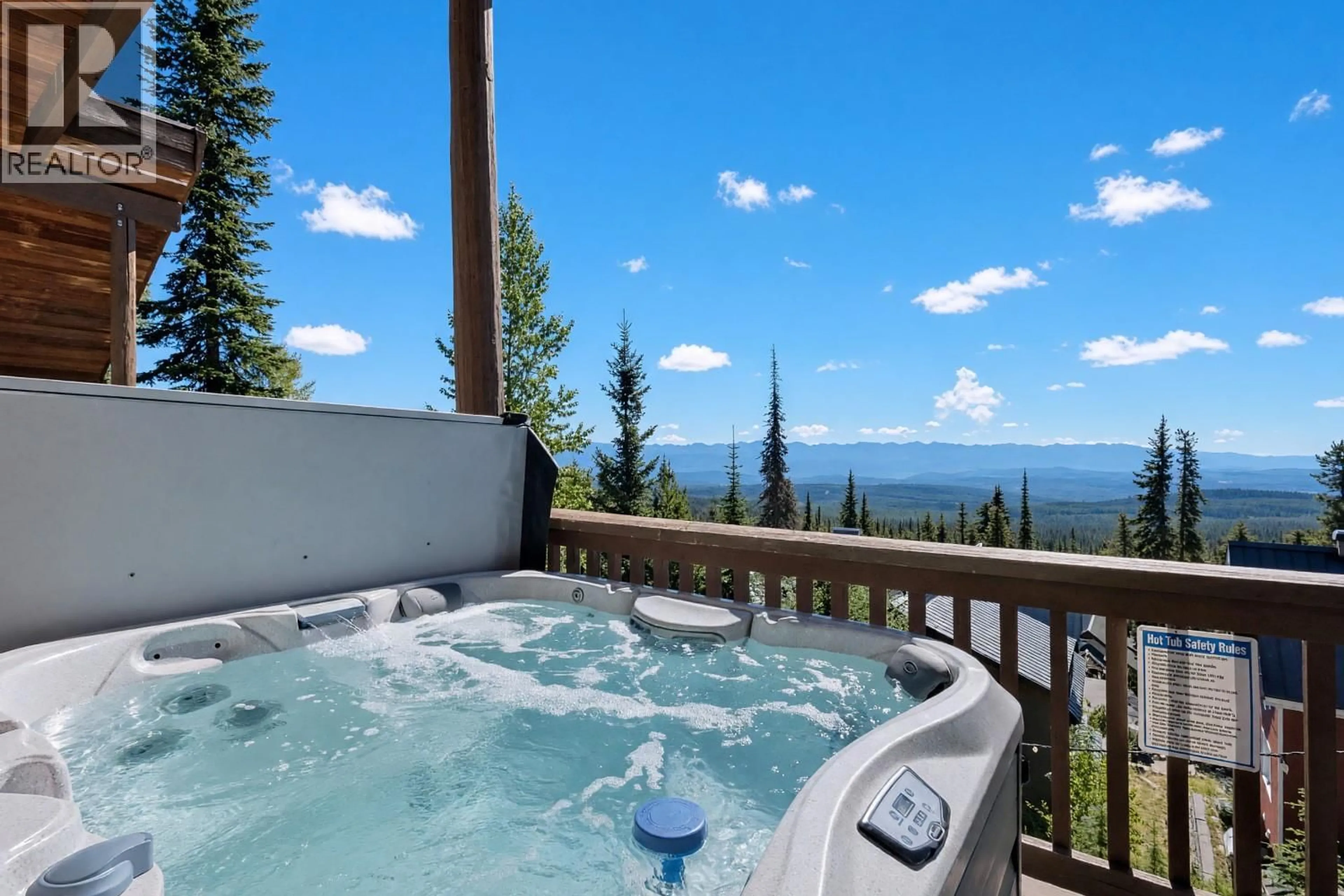 Patio, mountain view for C - 5877 SNOW PINES CRESCENT, Big White British Columbia V1W2L8