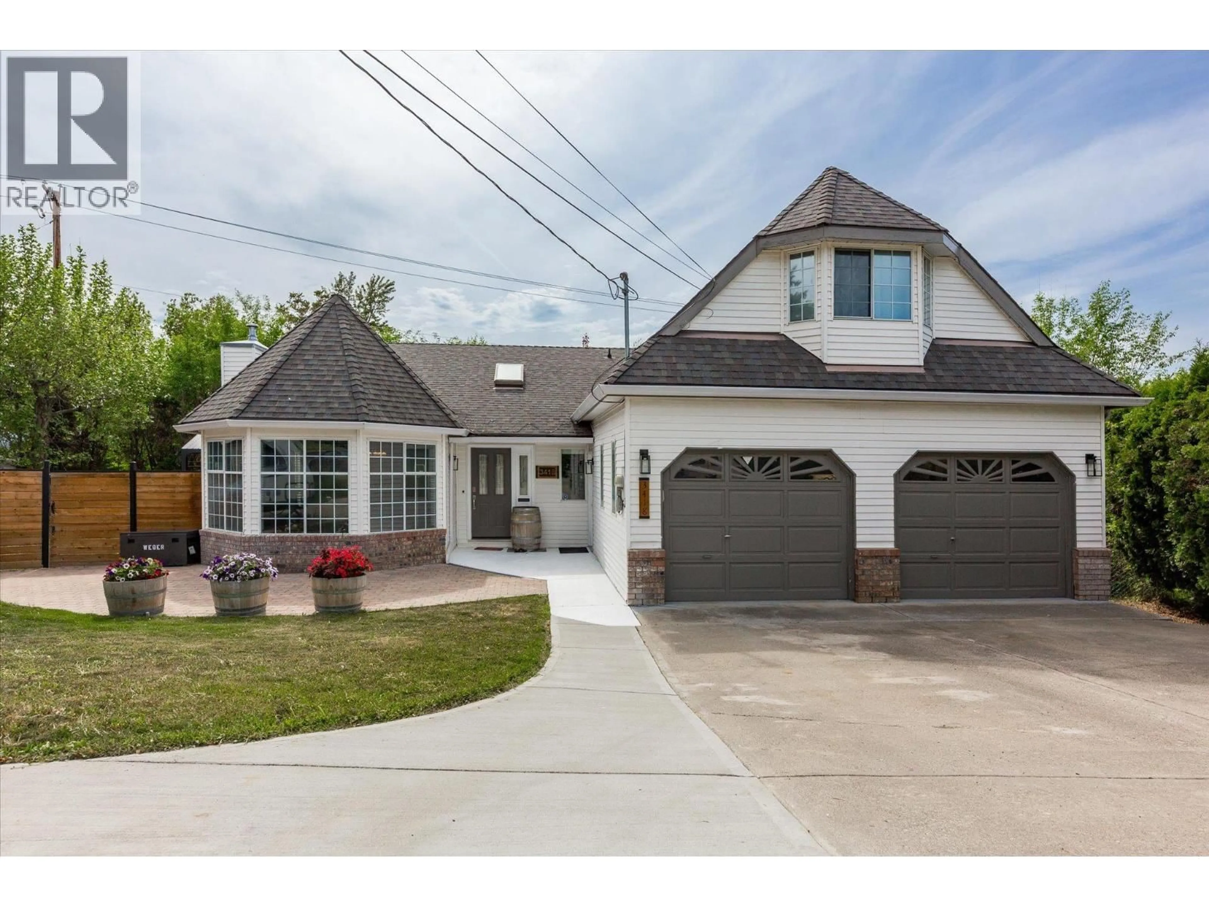 Home with brick exterior material, street for 3418 MARIPOSA COURT, Kelowna British Columbia V1W2S9