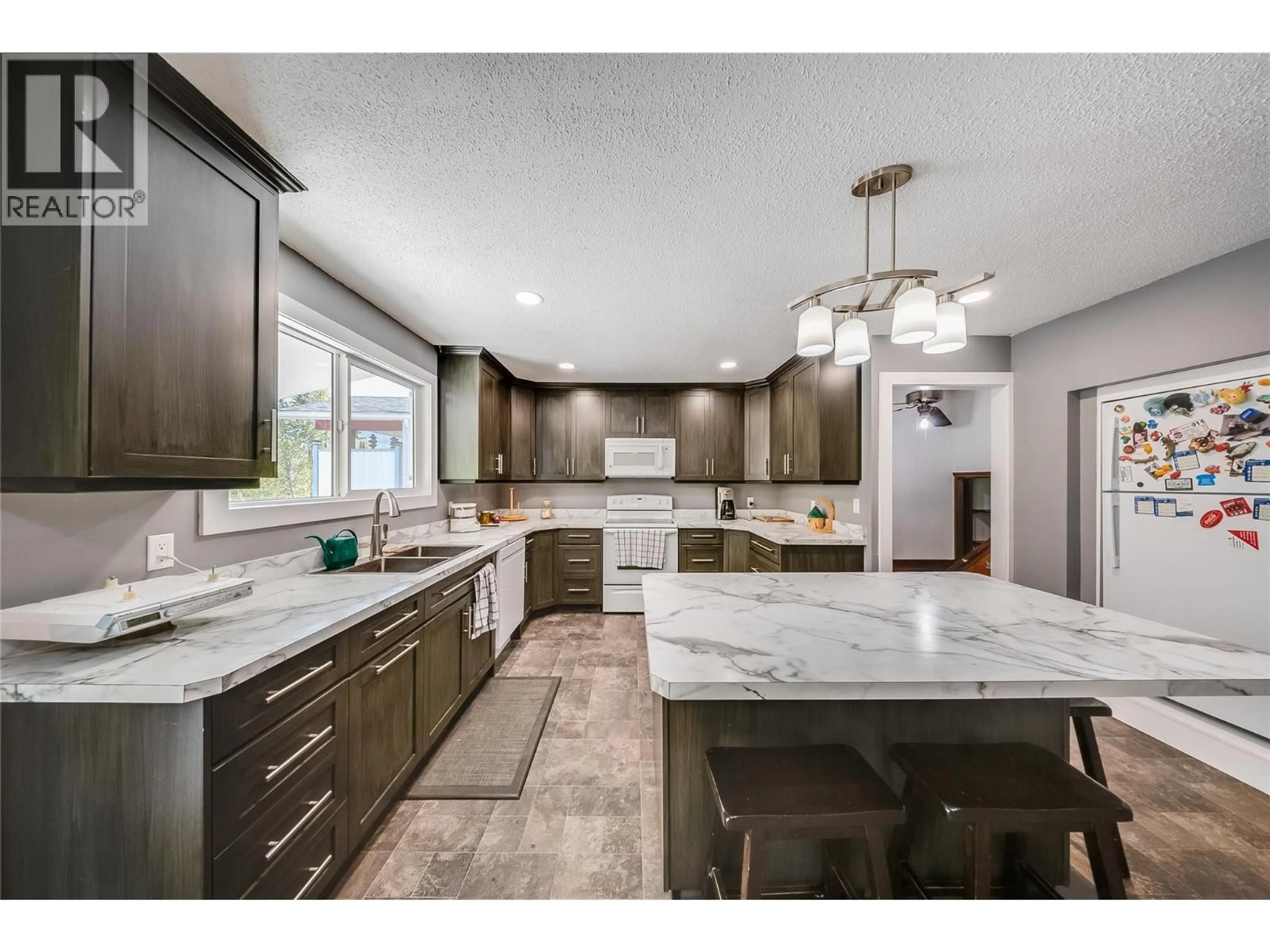 Open concept kitchen, ceramic/tile floor for 1762 FIRST STREET, Fruitvale British Columbia V0G1L0