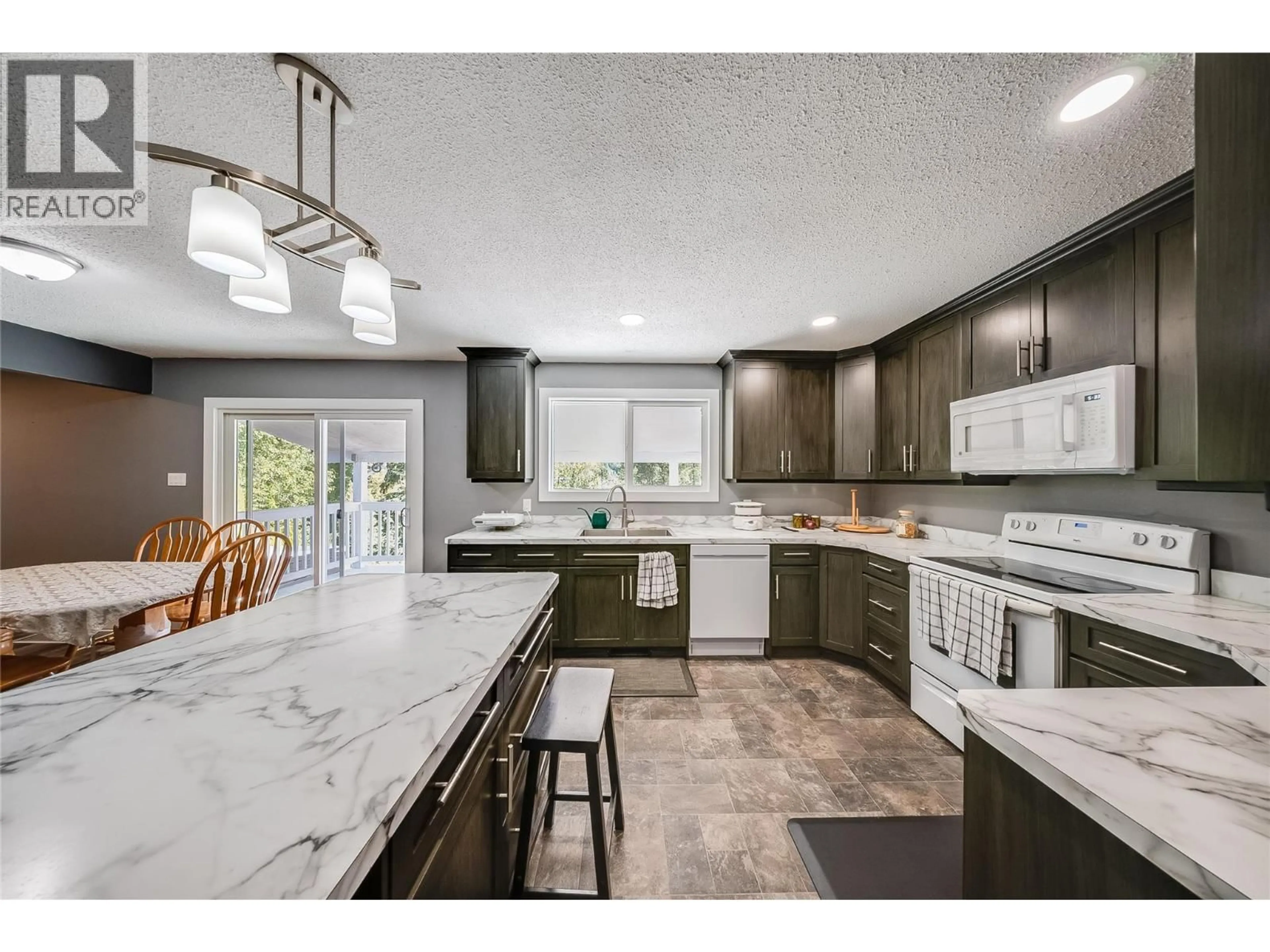 Open concept kitchen, ceramic/tile floor for 1762 FIRST STREET, Fruitvale British Columbia V0G1L0