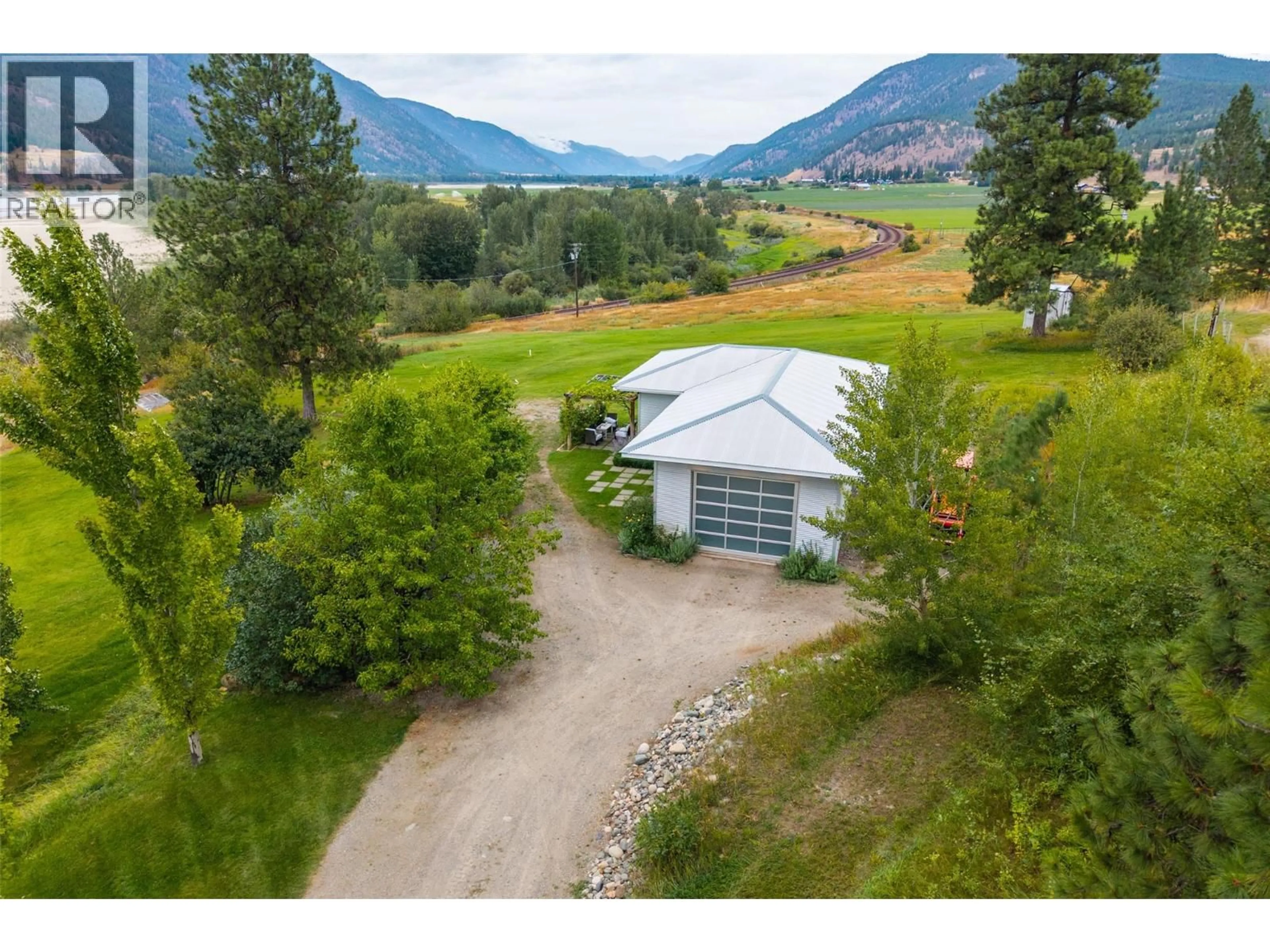 A pic from outside/outdoor area/front of a property/back of a property/a pic from drone, mountain view for 8121 LYONS ROAD, Kamloops British Columbia V0E1Z2