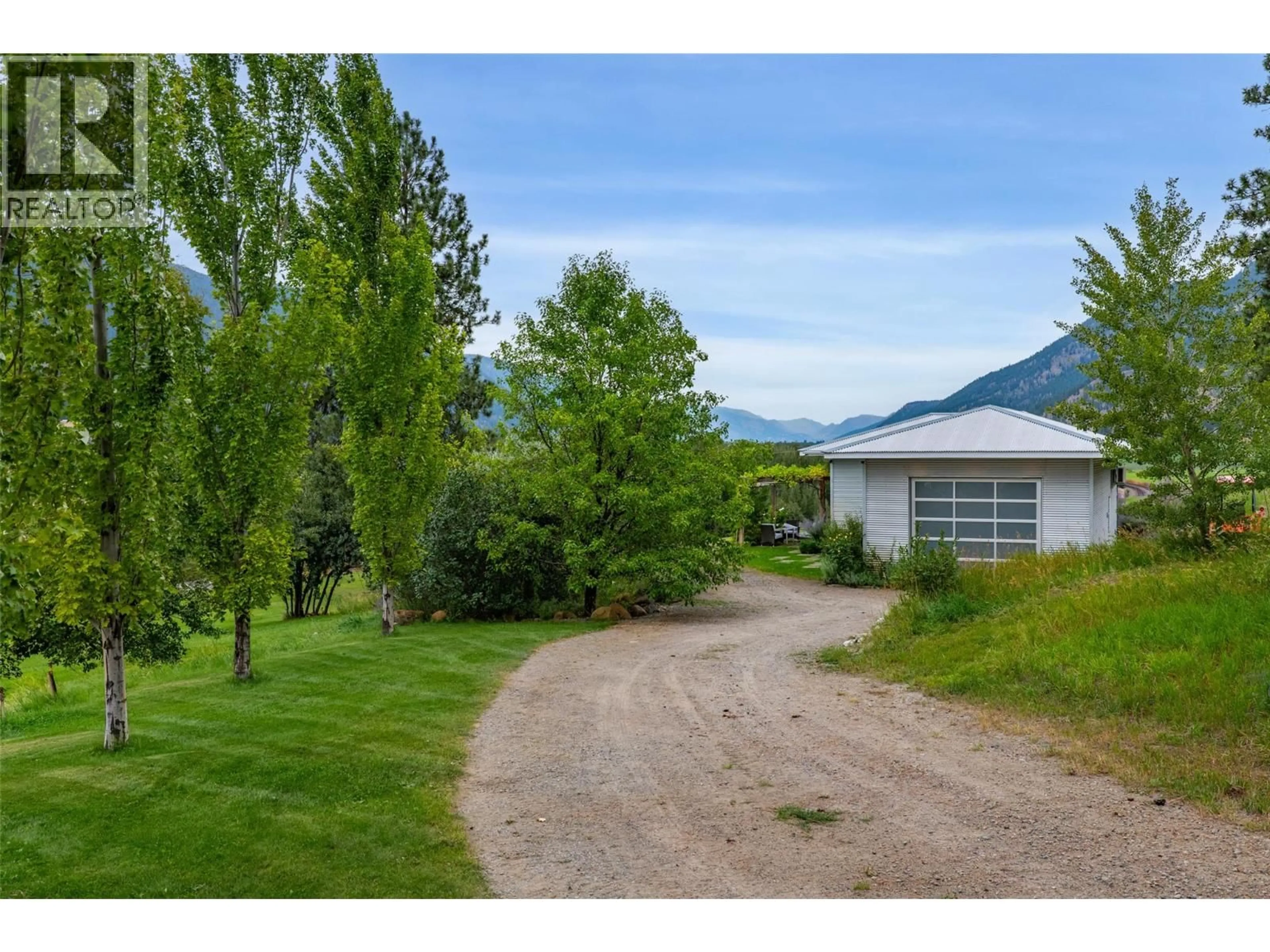 A pic from outside/outdoor area/front of a property/back of a property/a pic from drone, mountain view for 8121 LYONS ROAD, Kamloops British Columbia V0E1Z2
