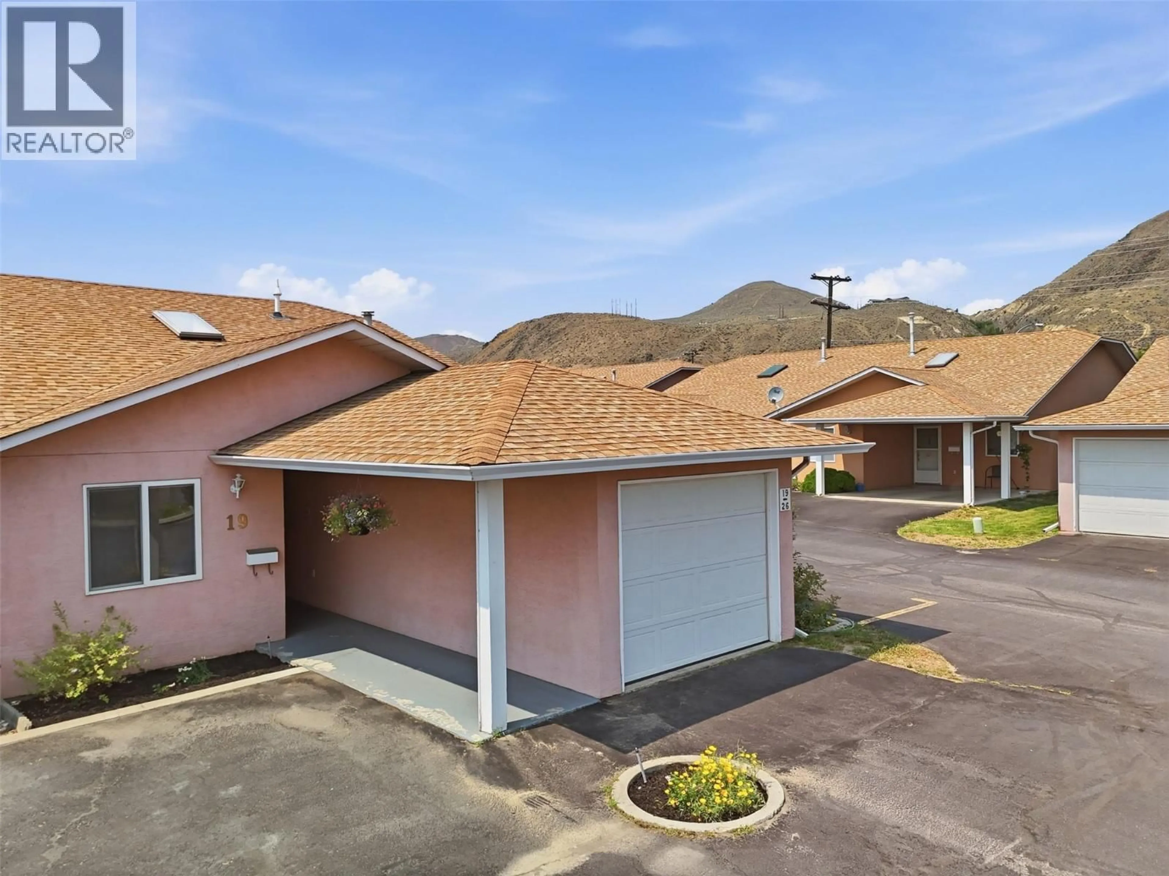 A pic from outside/outdoor area/front of a property/back of a property/a pic from drone, mountain view for 19 - 1285 14TH STREET, Kamloops British Columbia V2B8K9