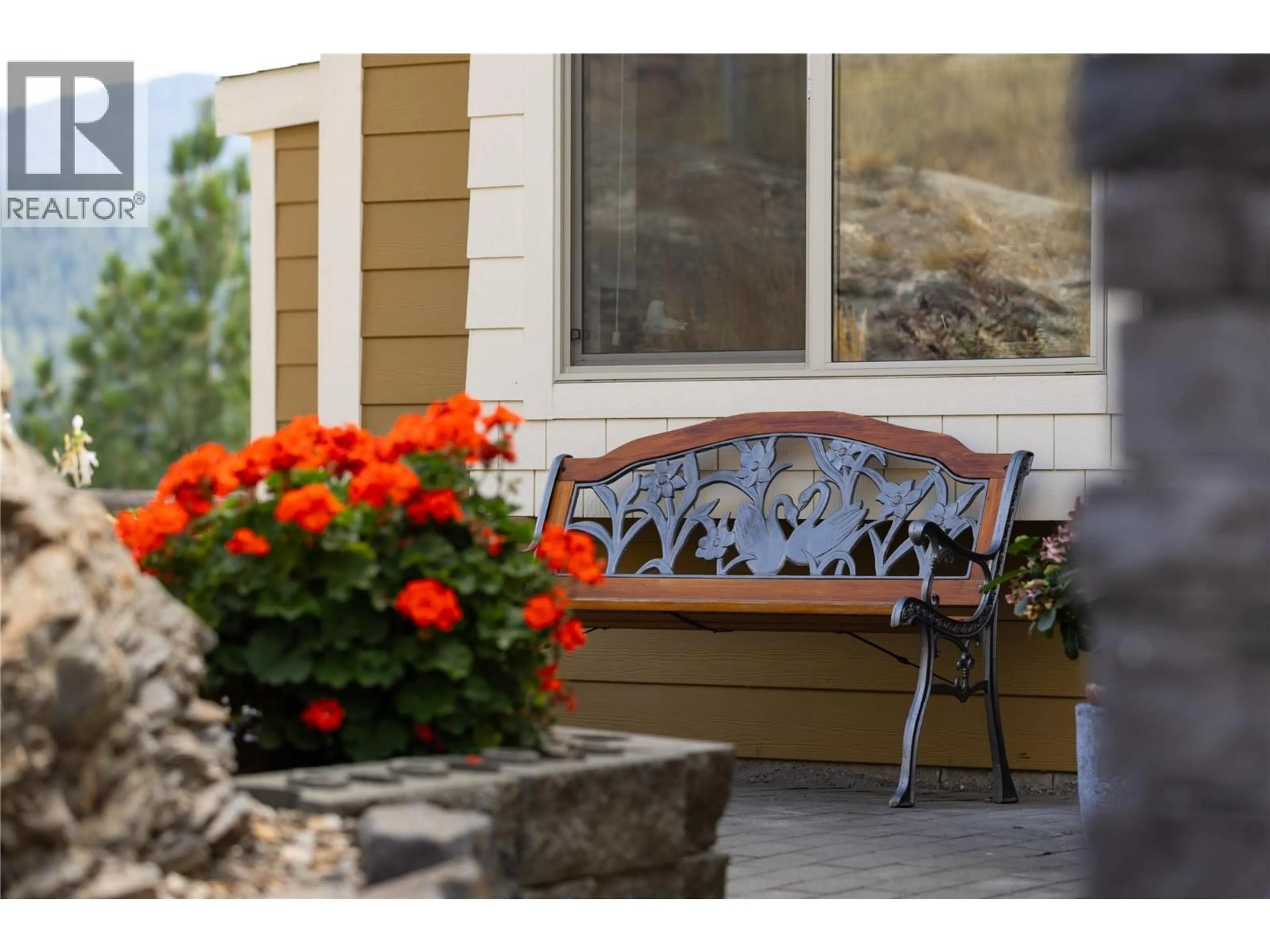 Home with vinyl exterior material, street for 7055 APEX DRIVE, Vernon British Columbia V1B3Z4