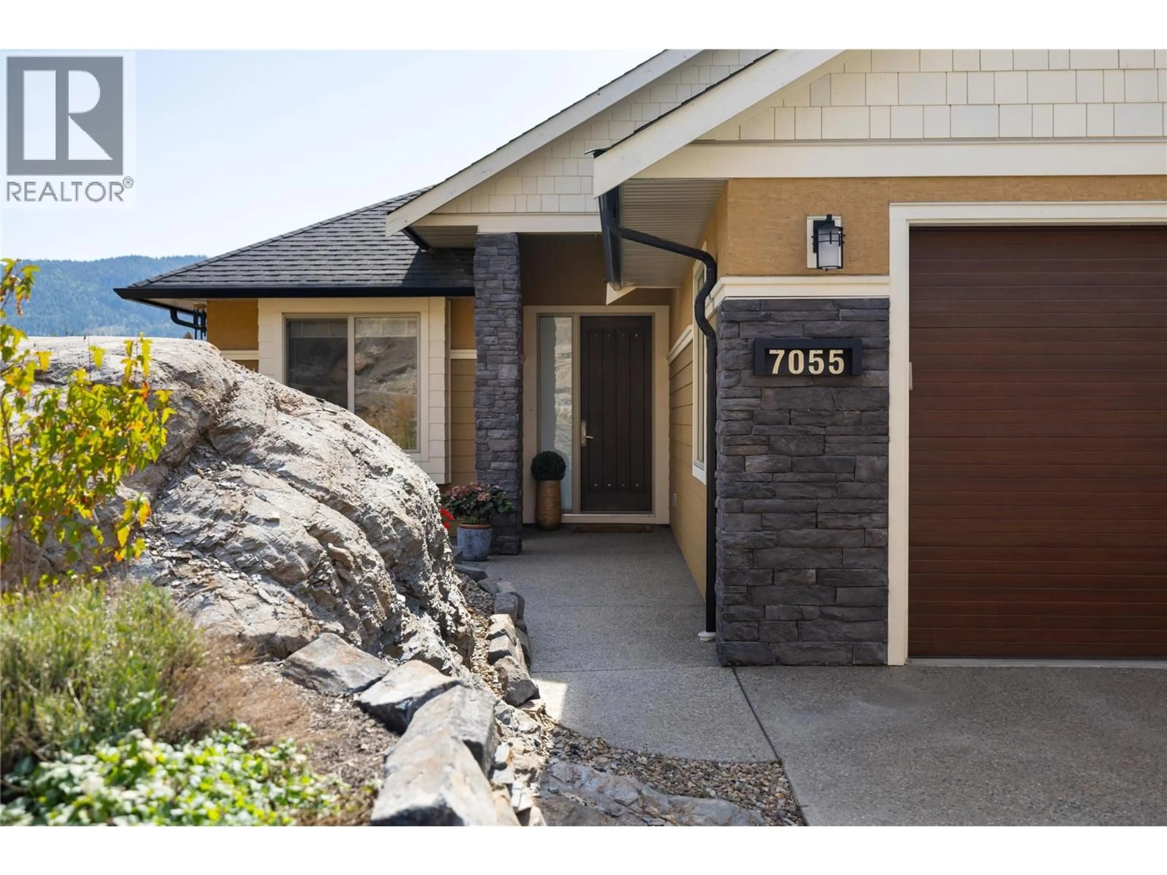 Home with brick exterior material, street for 7055 APEX DRIVE, Vernon British Columbia V1B3Z4
