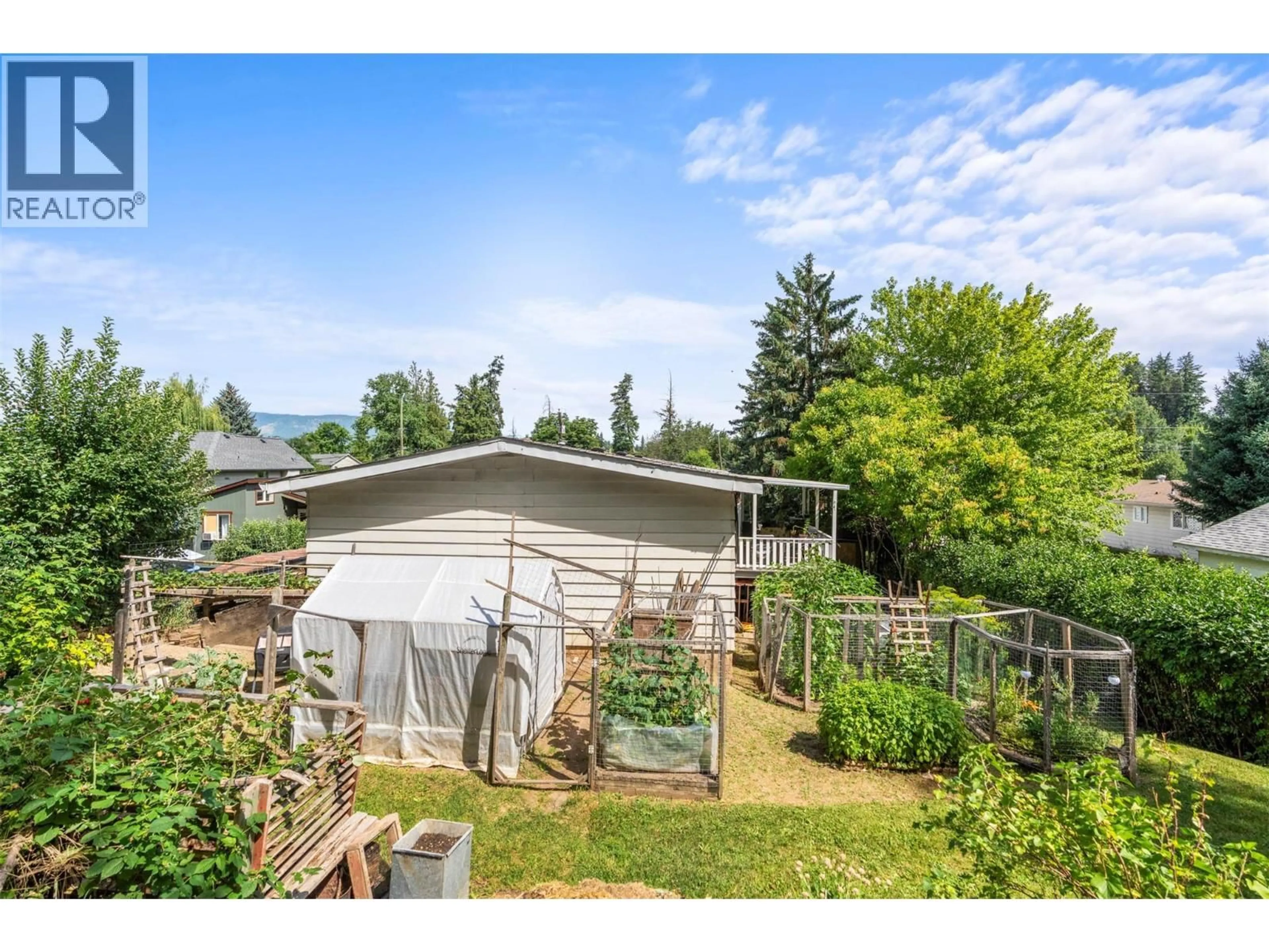 A pic from outside/outdoor area/front of a property/back of a property/a pic from drone, mountain view for 3475 JACKSON AVENUE, Armstrong British Columbia V0E1B2