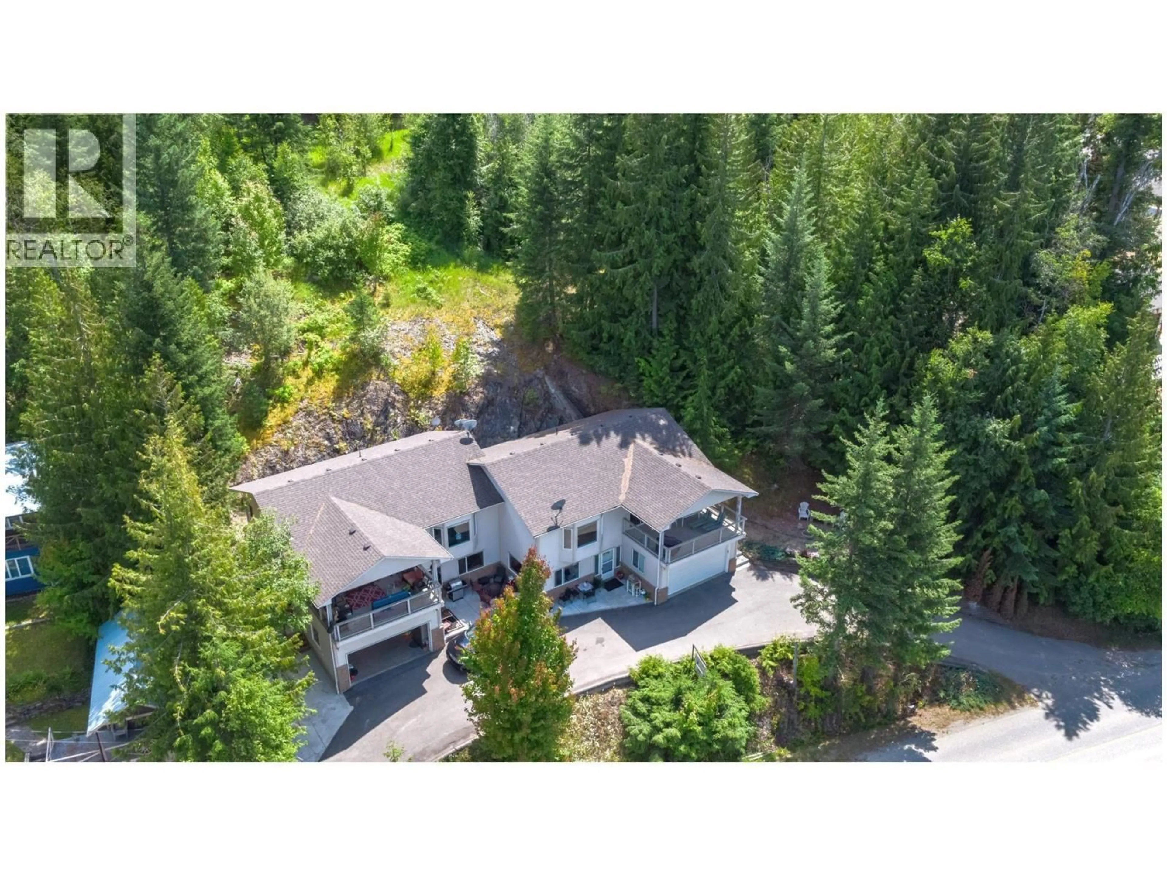 A pic from outside/outdoor area/front of a property/back of a property/a pic from drone, forest/trees view for D - 3610 EAGLE BAY ROAD, Eagle Bay British Columbia V0E1T0