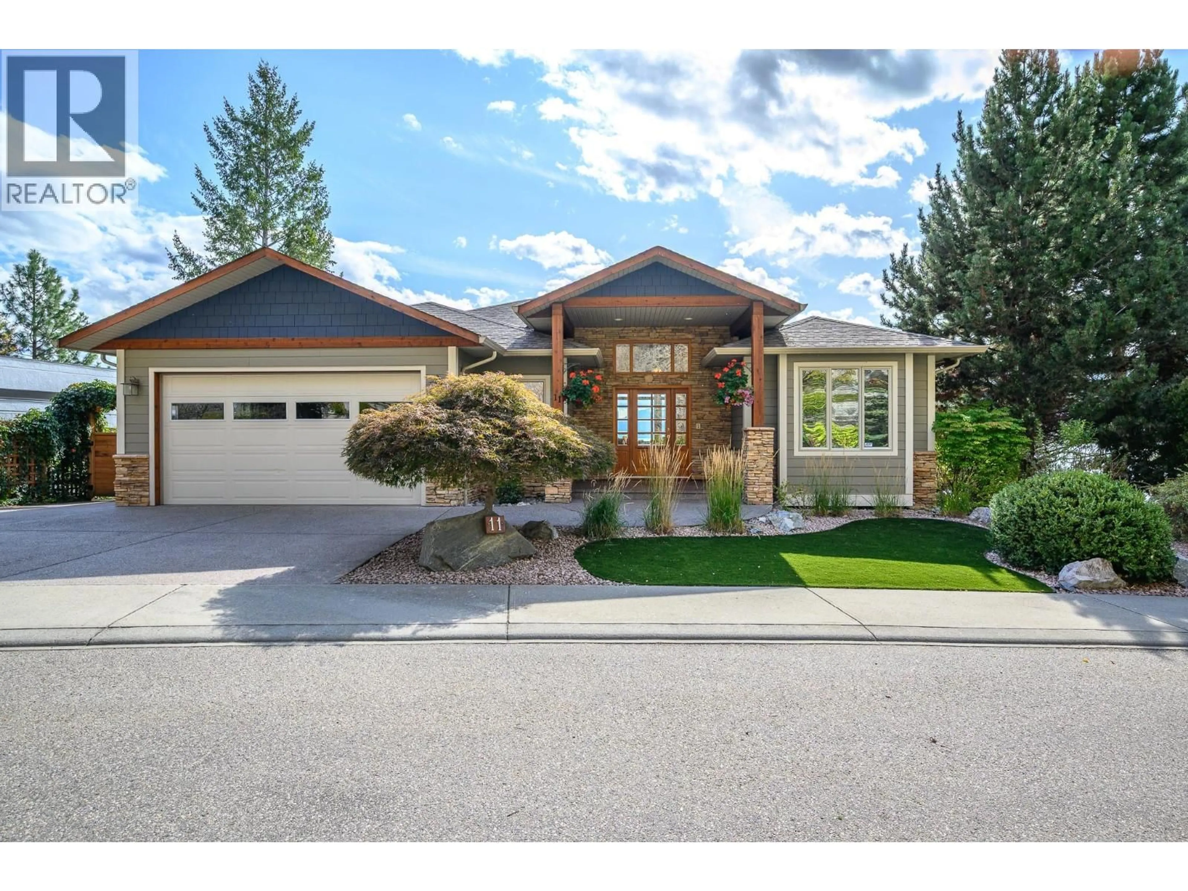 Home with vinyl exterior material, street for 11 - 100 KESTREL PLACE, Vernon British Columbia V1H1T6