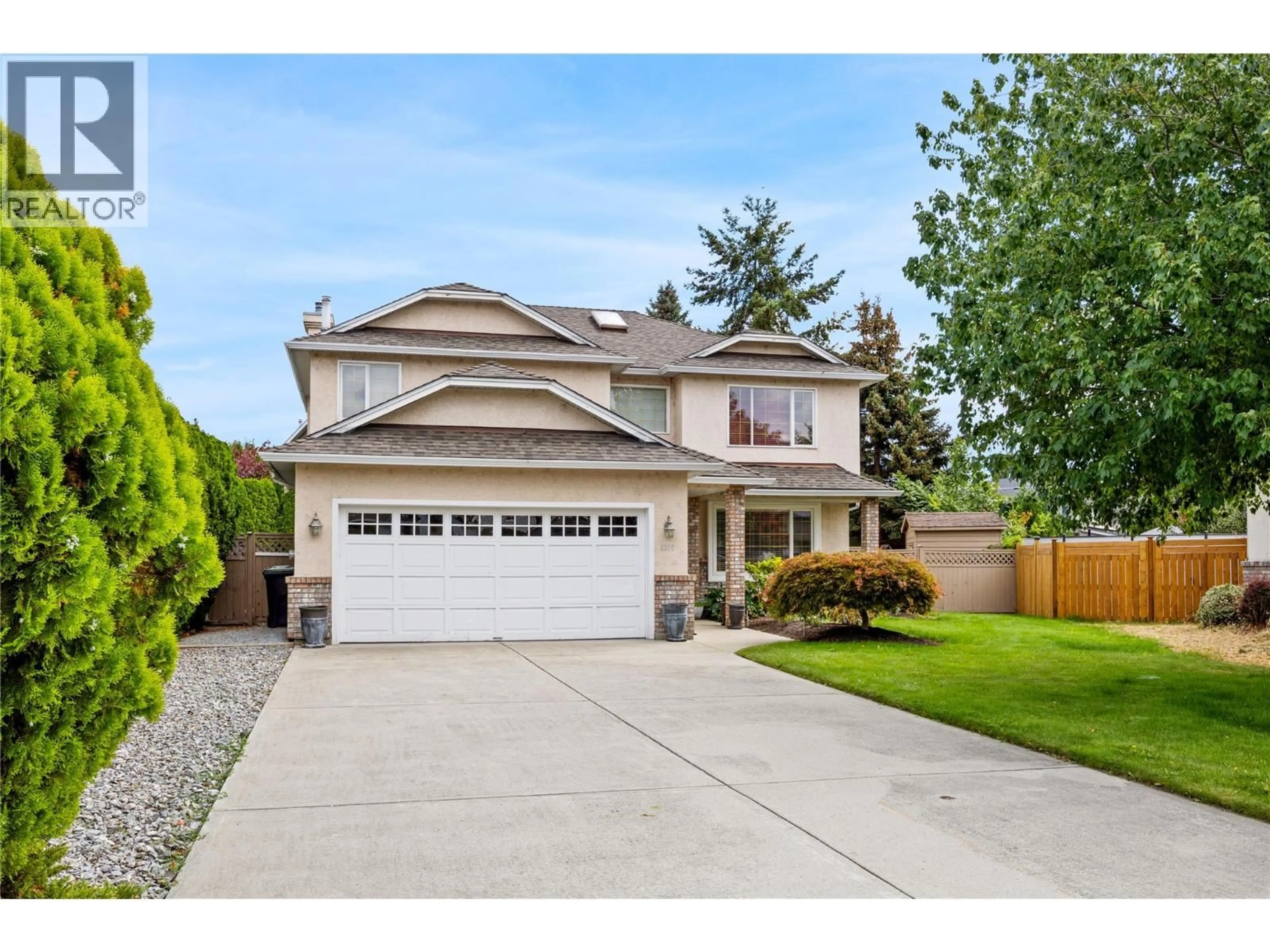 Home with vinyl exterior material, street for 4015 LOGIE COURT, Kelowna British Columbia V1W3Y6