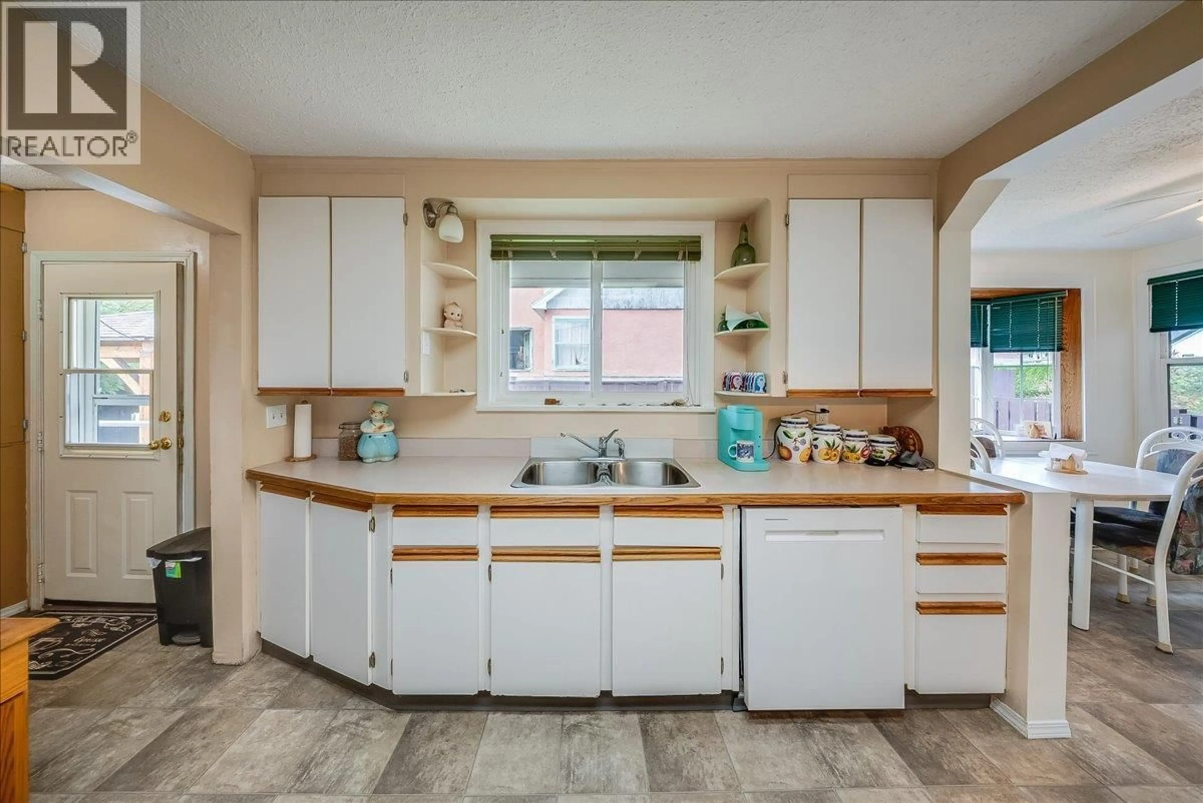 Standard kitchen, ceramic/tile floor for 2038 SIXTH AVENUE, Trail British Columbia V1R3B5