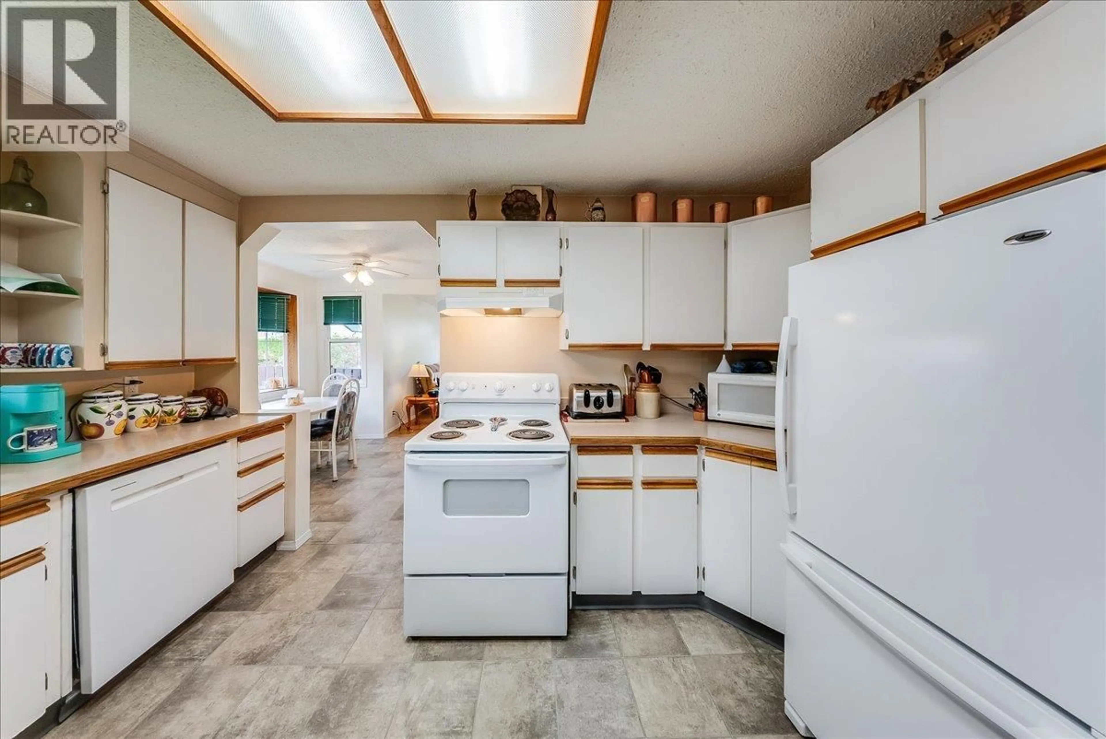 Open concept kitchen, ceramic/tile floor for 2038 SIXTH AVENUE, Trail British Columbia V1R3B5