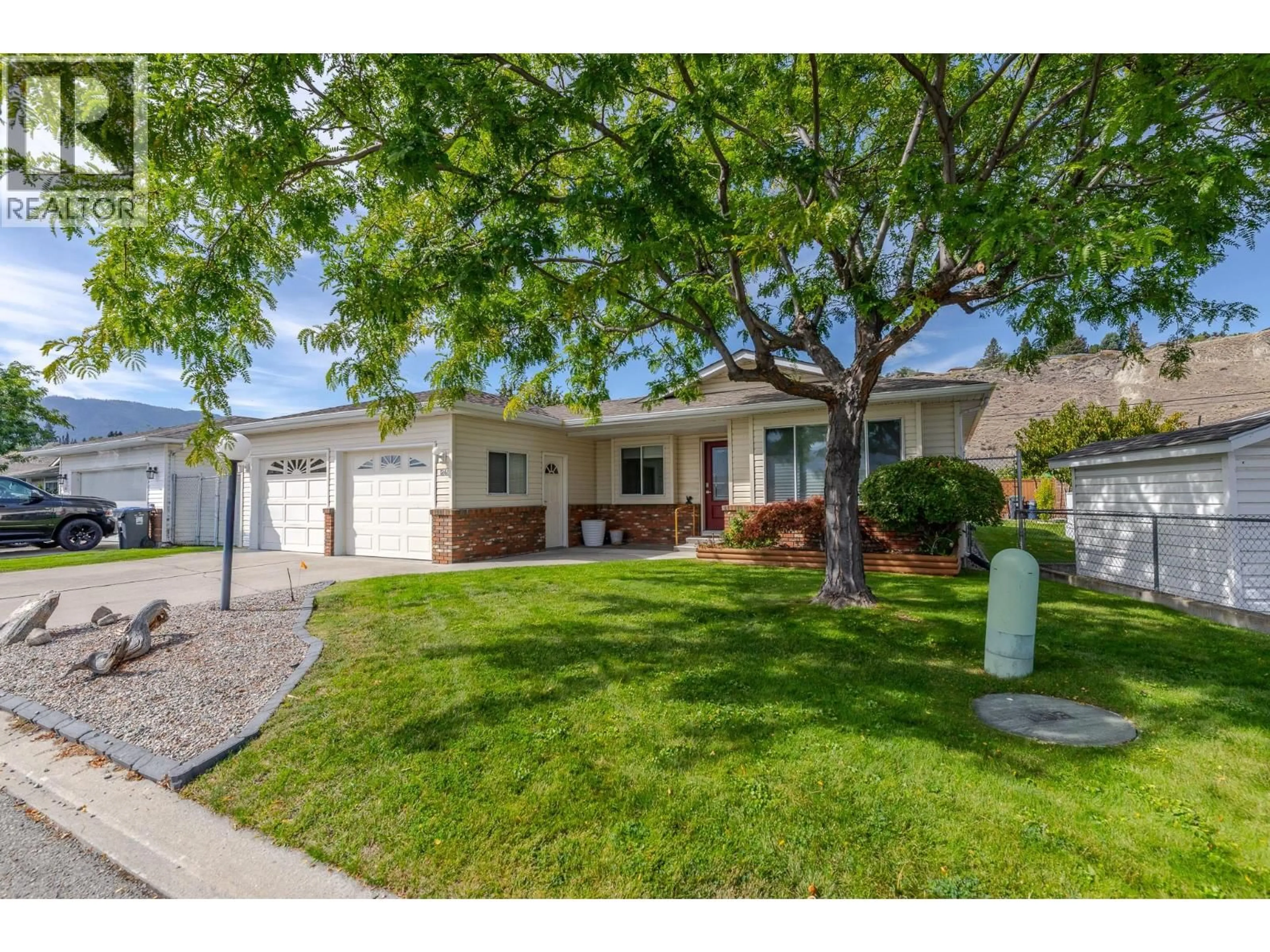Home with vinyl exterior material, street for 124 HERON DRIVE, Penticton British Columbia V2A8K6