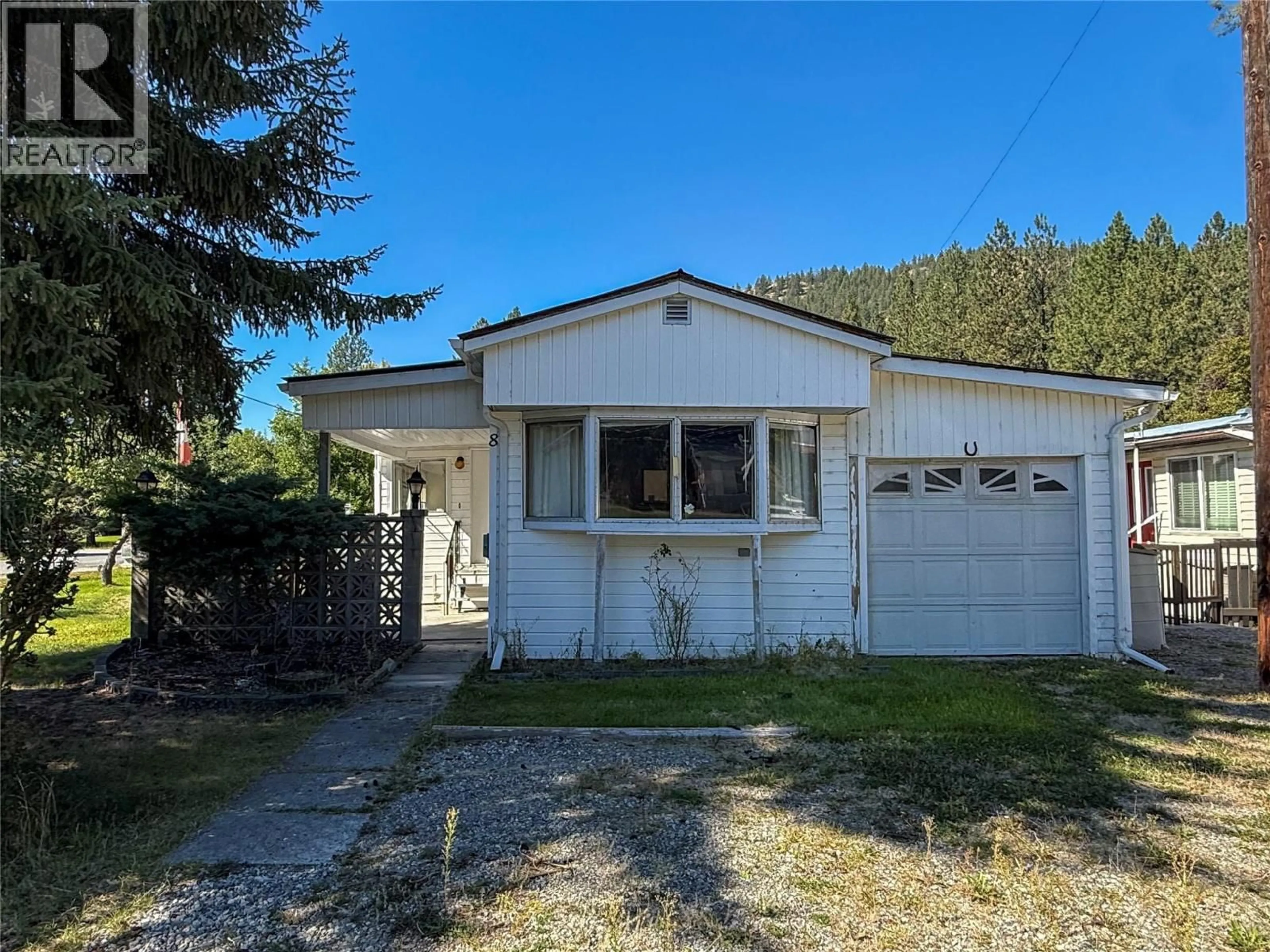 Home with vinyl exterior material, street for 8 - 7105 NORTH FORK ROAD, Grand Forks British Columbia V0H1H2