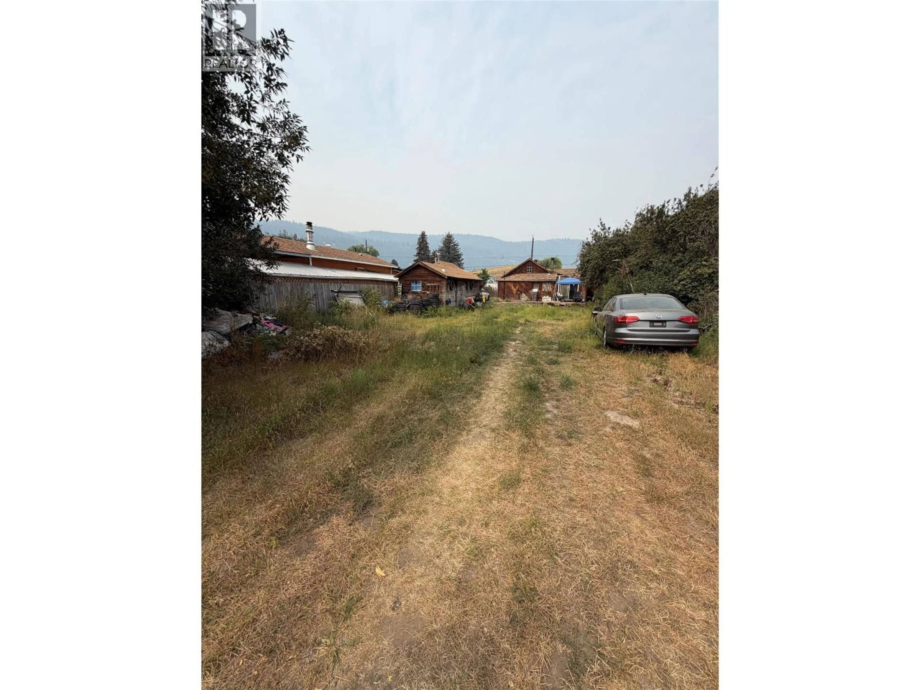 A pic from outside/outdoor area/front of a property/back of a property/a pic from drone, unknown for 1606 PINE STREET, Merritt British Columbia V1K1K8