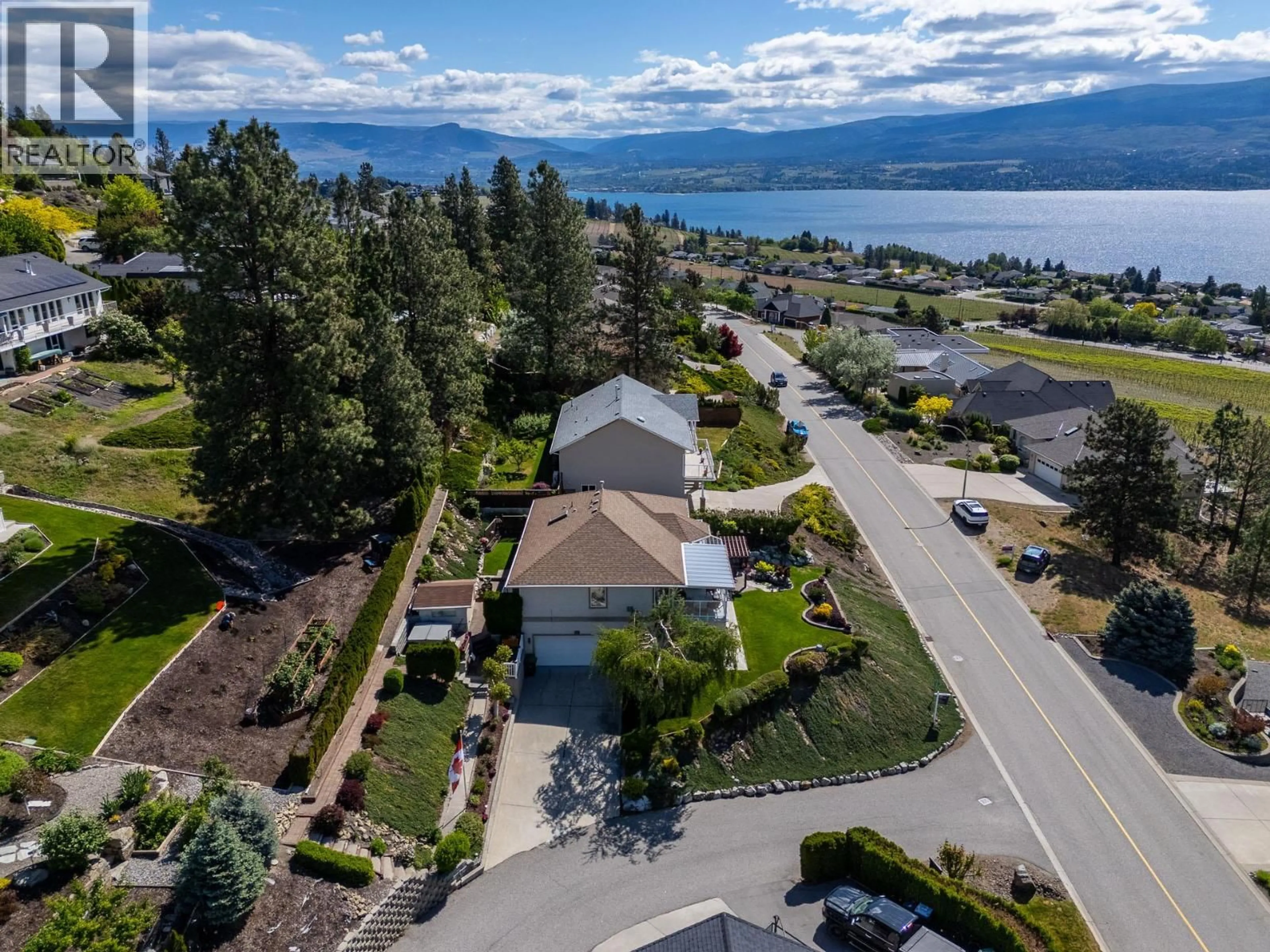 A pic from outside/outdoor area/front of a property/back of a property/a pic from drone, water/lake/river/ocean view for 1350 GREGORY ROAD, West Kelowna British Columbia V1Z3P2