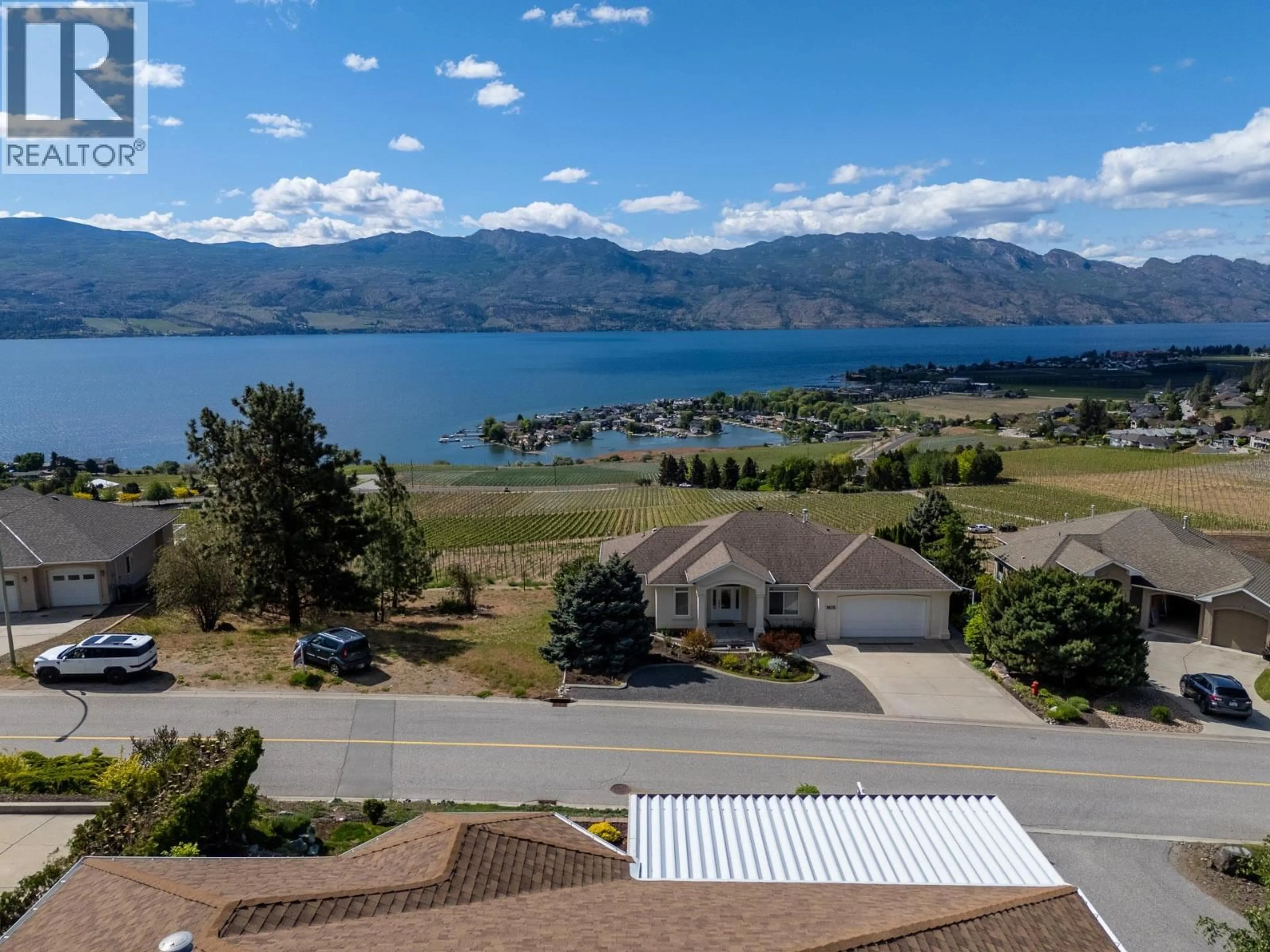 A pic from outside/outdoor area/front of a property/back of a property/a pic from drone, water/lake/river/ocean view for 1350 GREGORY ROAD, West Kelowna British Columbia V1Z3P2