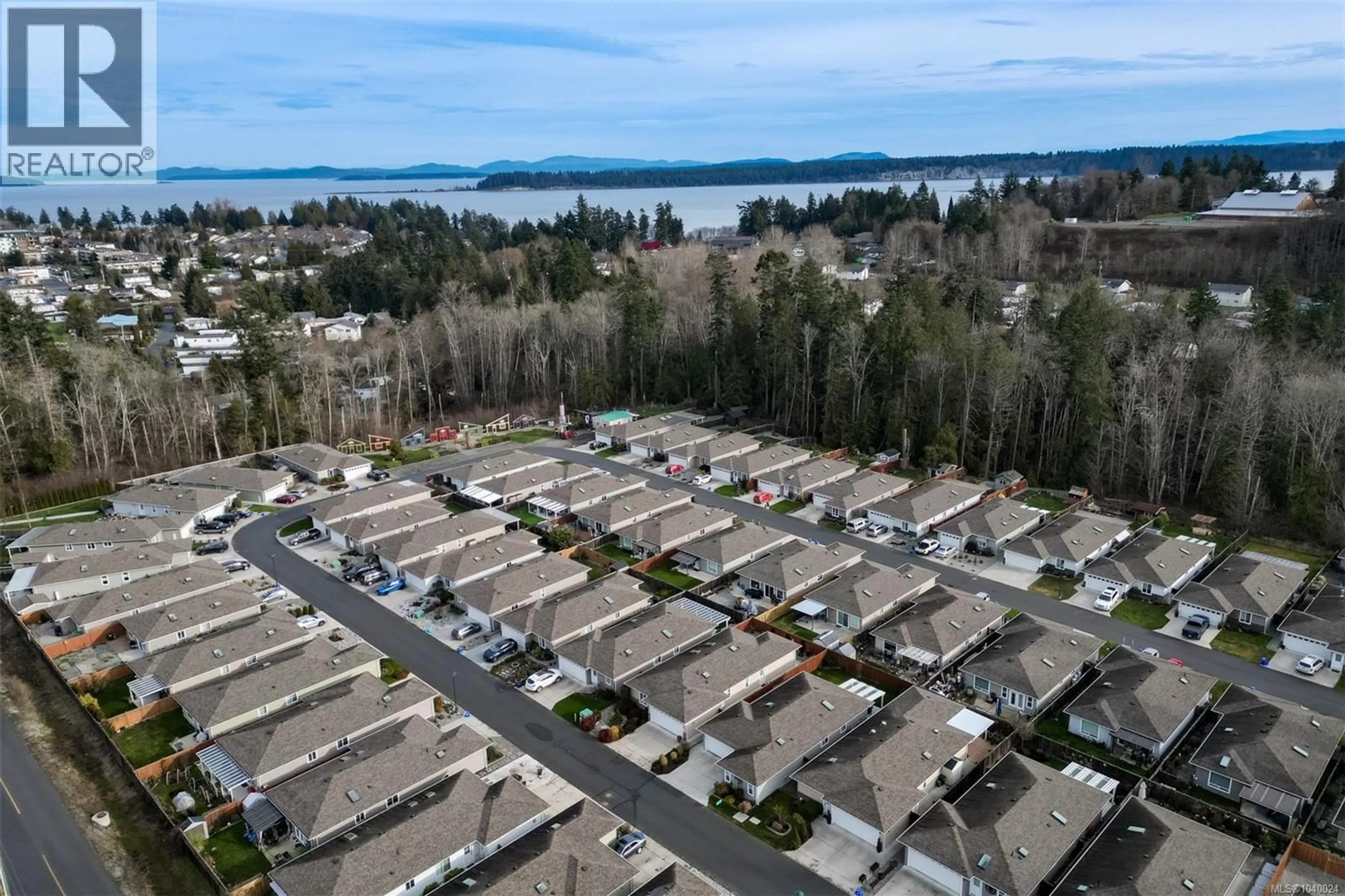 A pic from outside/outdoor area/front of a property/back of a property/a pic from drone, water/lake/river/ocean view for 52 - 7586 TETAYUT ROAD, Central Saanich British Columbia V8M0B4