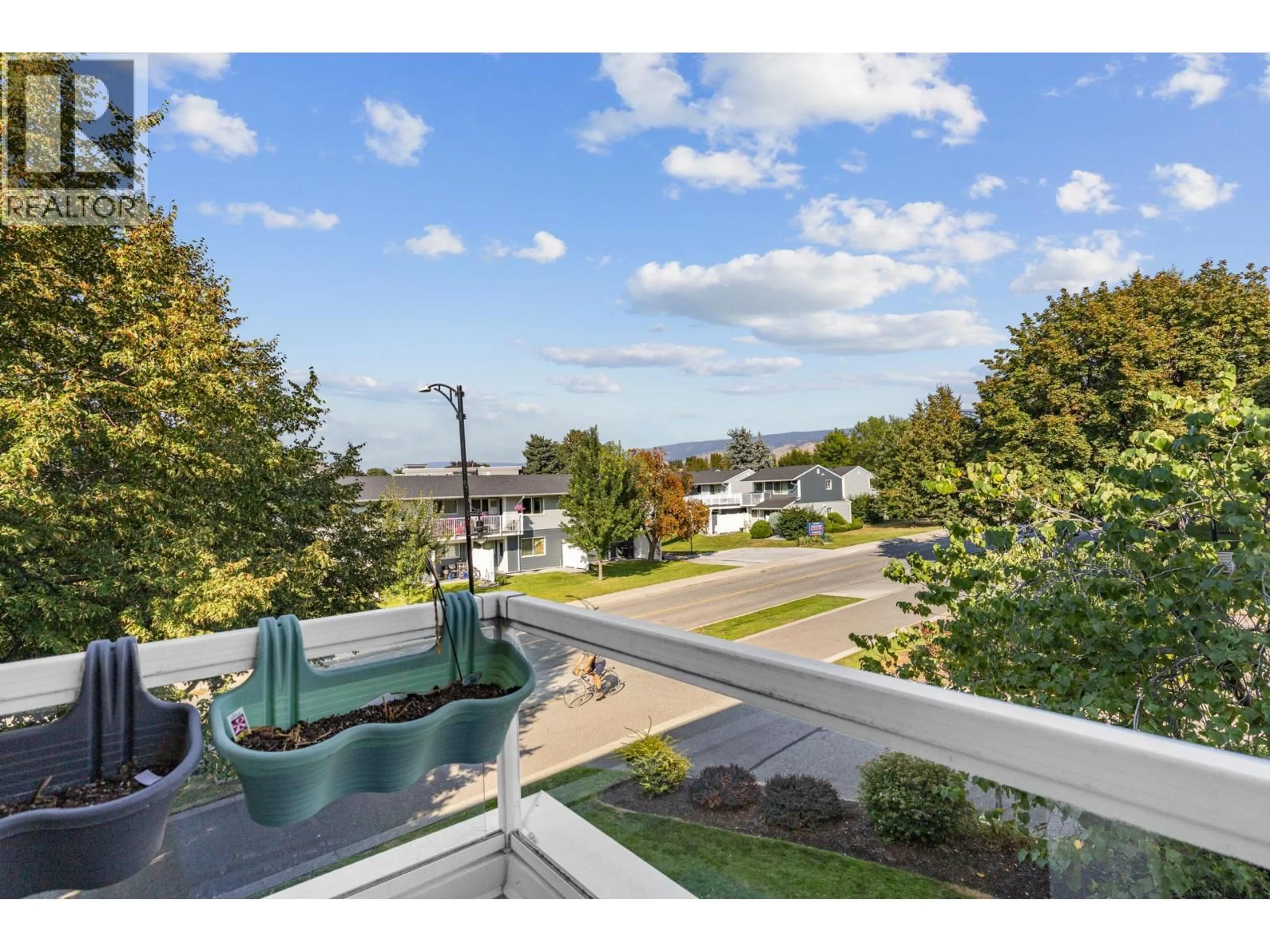 A pic from outside/outdoor area/front of a property/back of a property/a pic from drone, water/lake/river/ocean view for 212 - 727 HOUGHTON ROAD, Kelowna British Columbia V1X7J7