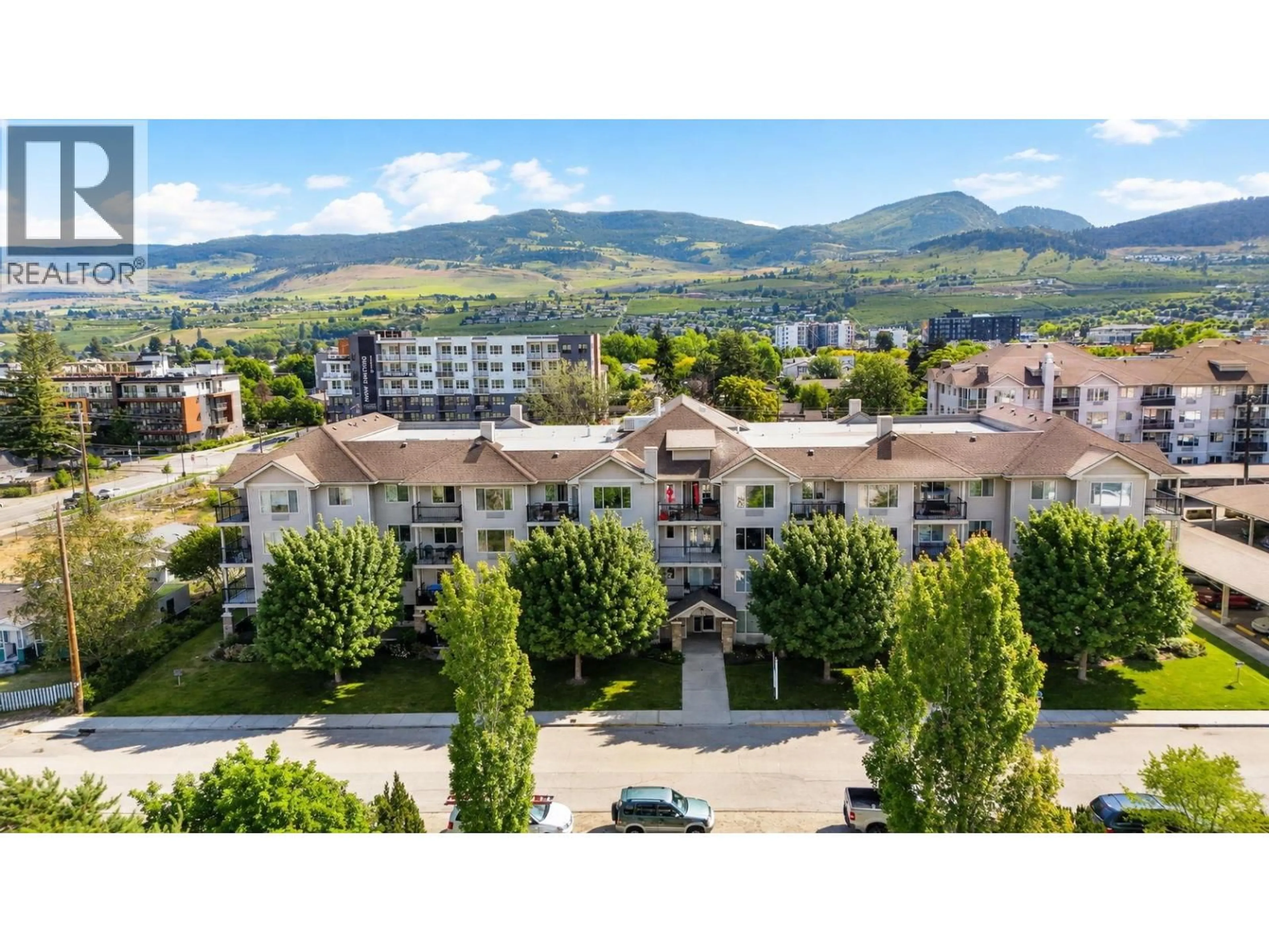 A pic from outside/outdoor area/front of a property/back of a property/a pic from drone, mountain view for 105 - 265 FROELICH ROAD, Kelowna British Columbia V1X3M6