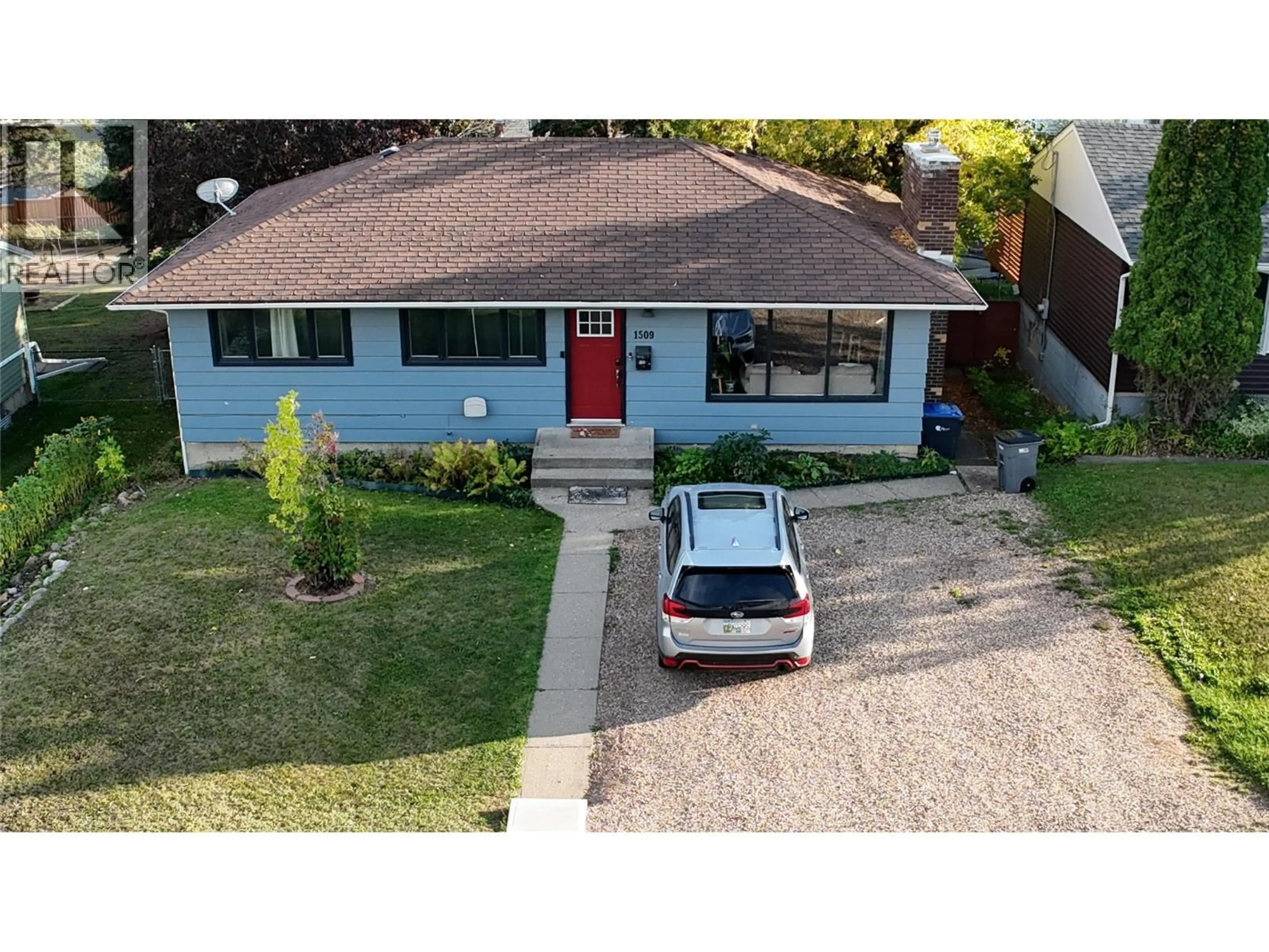 A pic from outside/outdoor area/front of a property/back of a property/a pic from drone, street for 1509 95 AVENUE, Dawson Creek British Columbia V1G1J9